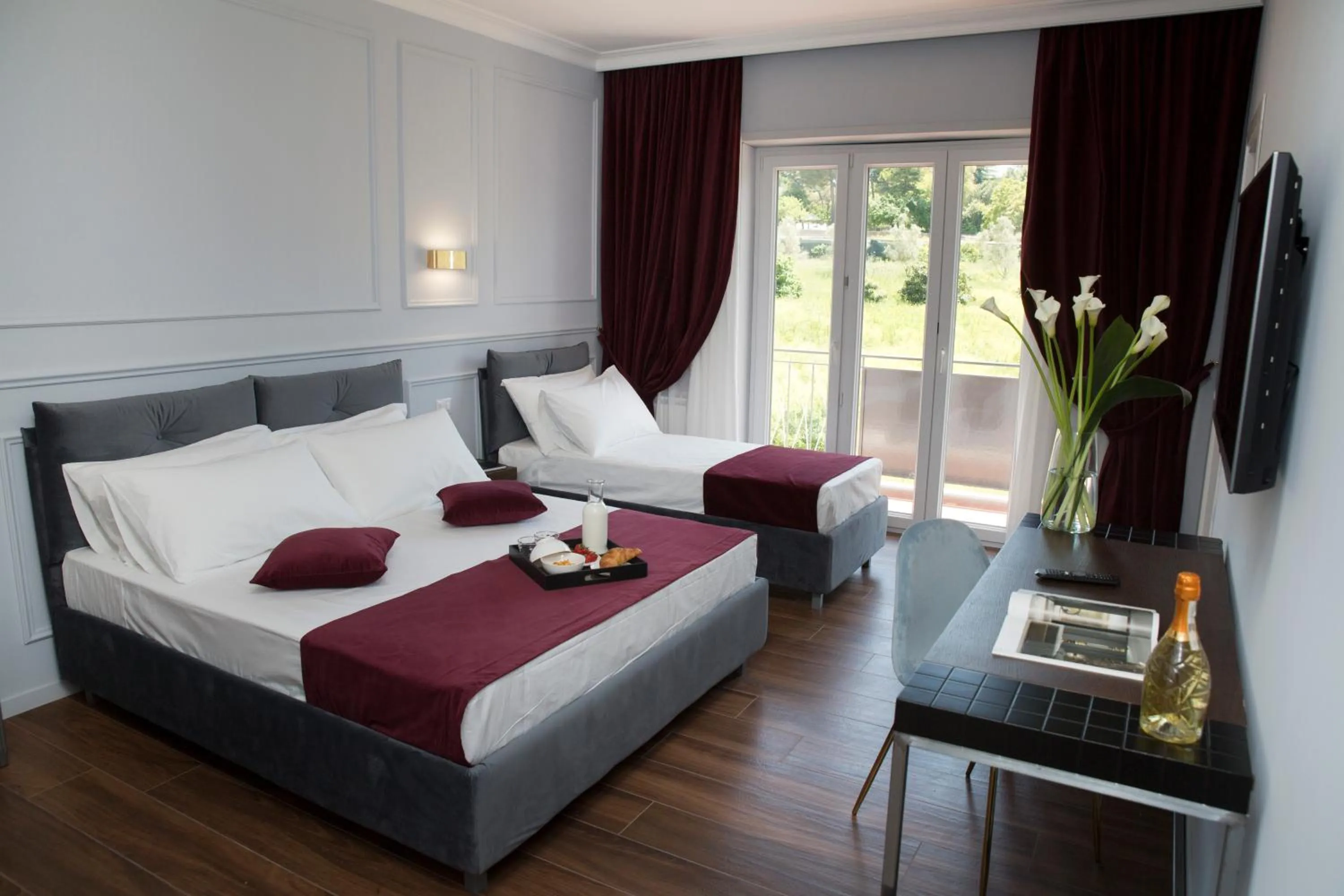 Bed in Unicum Roma Suites
