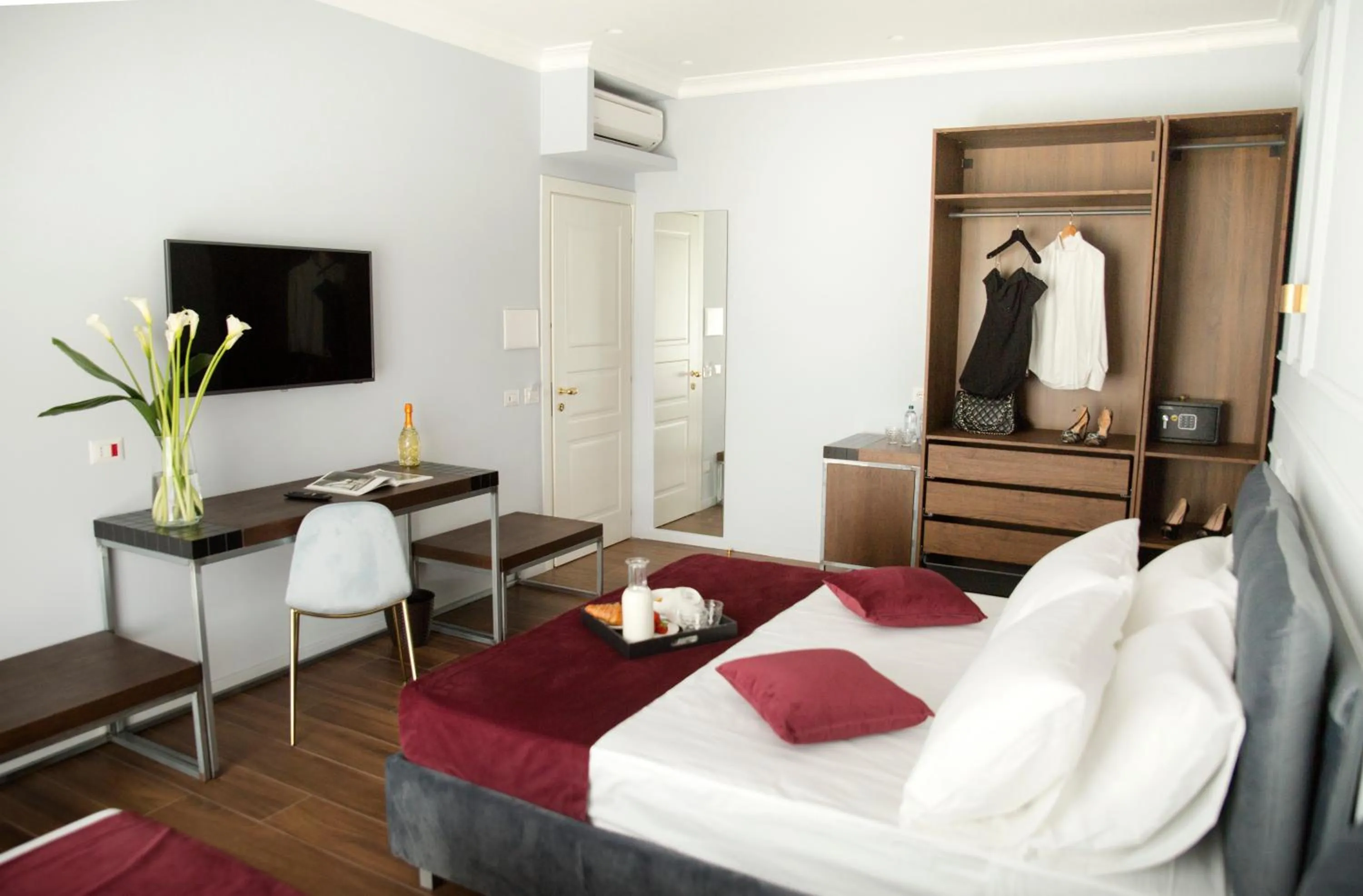 Bed in Unicum Roma Suites