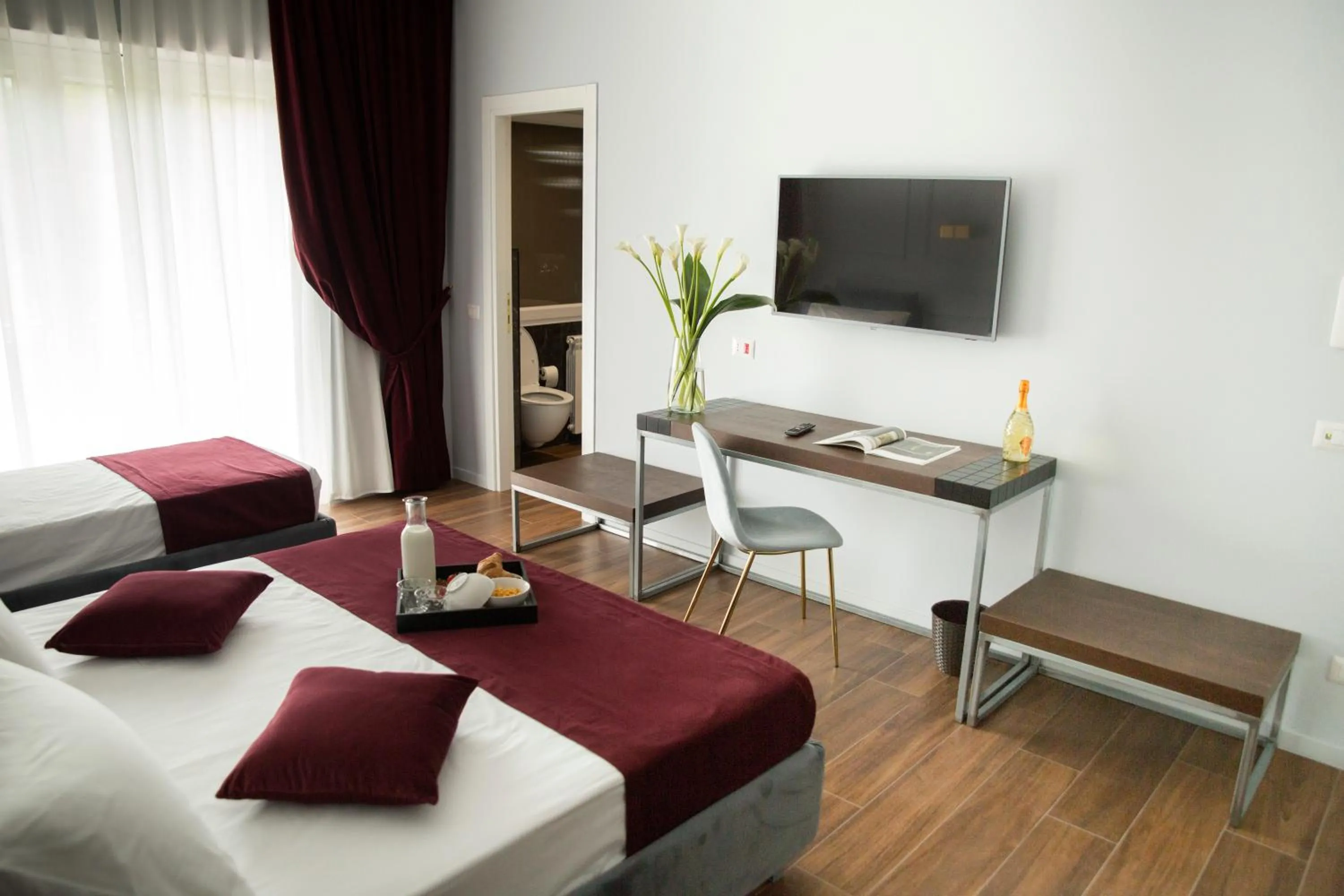 TV and multimedia, Bed in Unicum Roma Suites