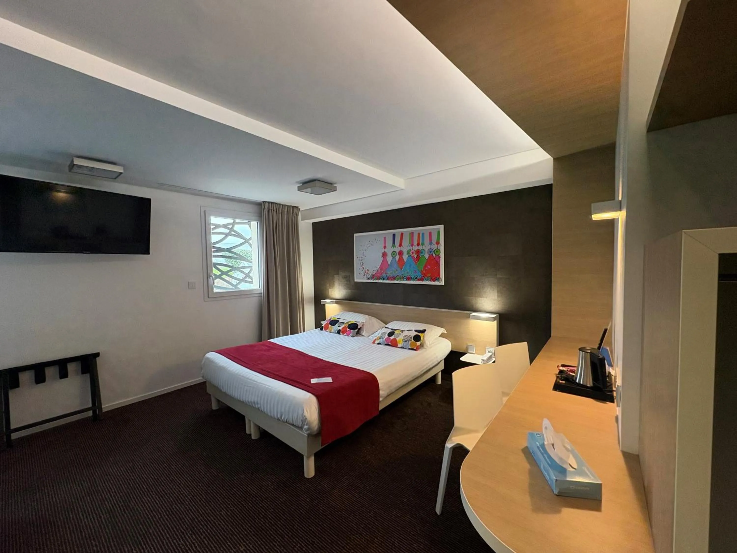 Photo of the whole room, Bed in Brit Hotel Quimper Nord