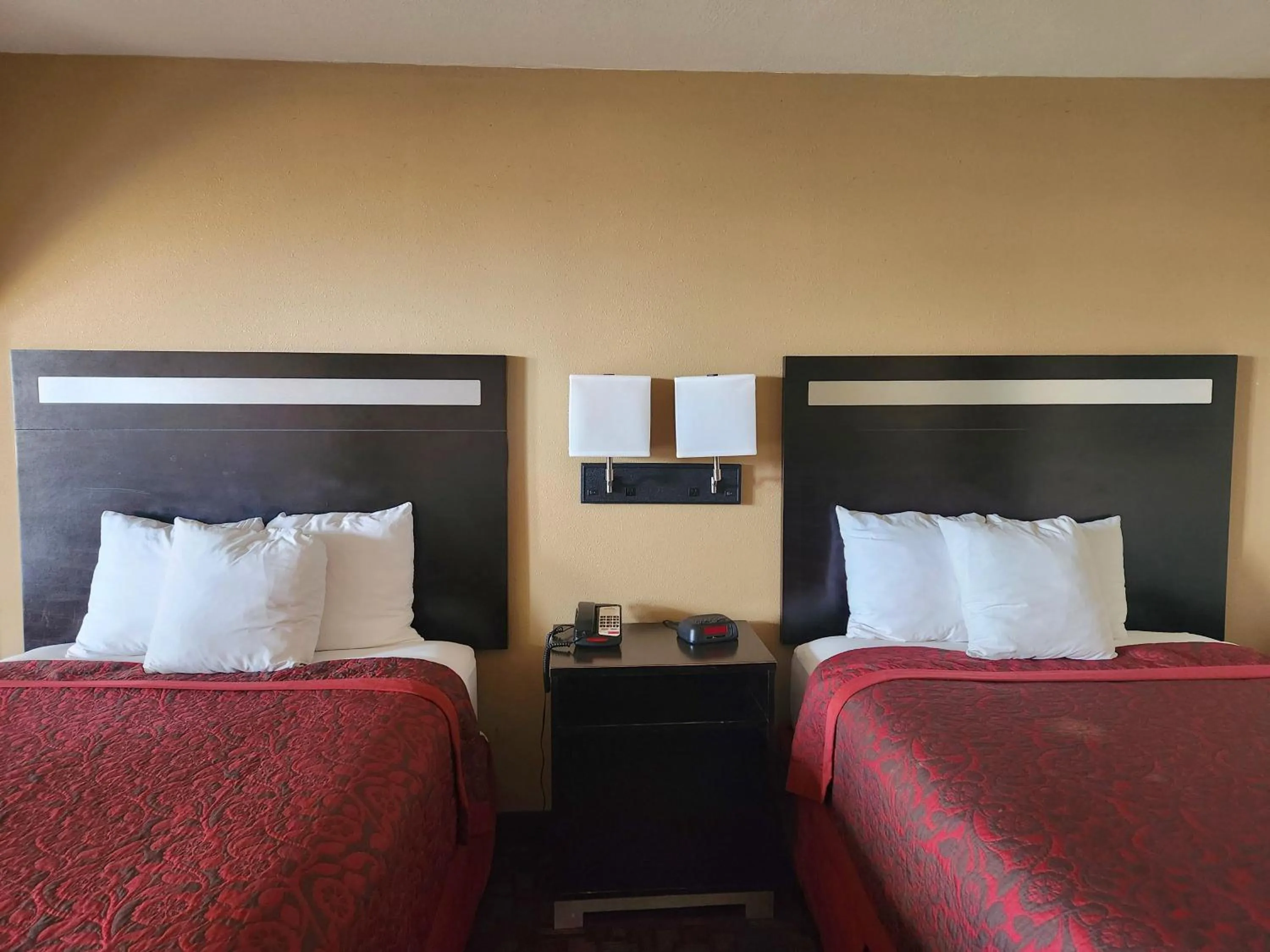 Bedroom, Bed in Days Inn by Wyndham Hammond