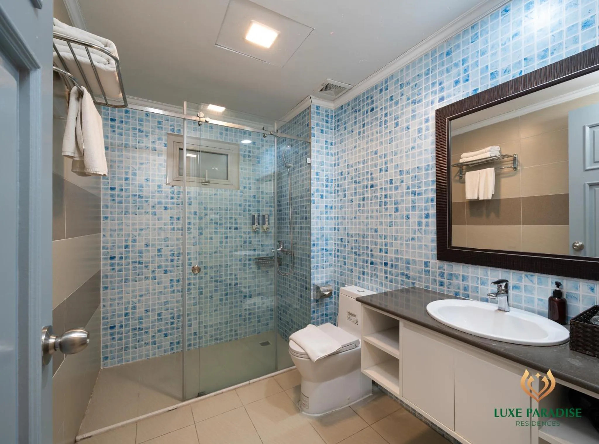 Toilet in Libra Hotel Residence by Luxe Paradise