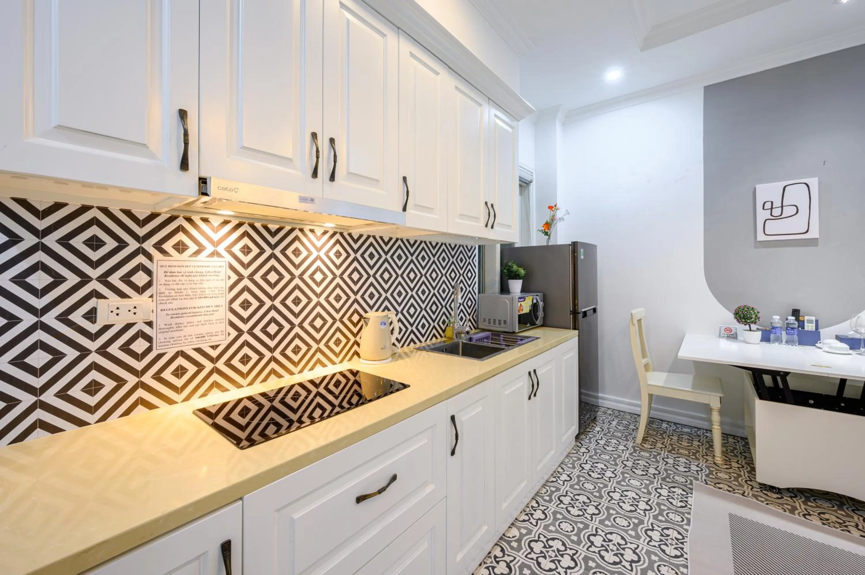 kitchen in Libra Hotel Residence by Luxe Paradise