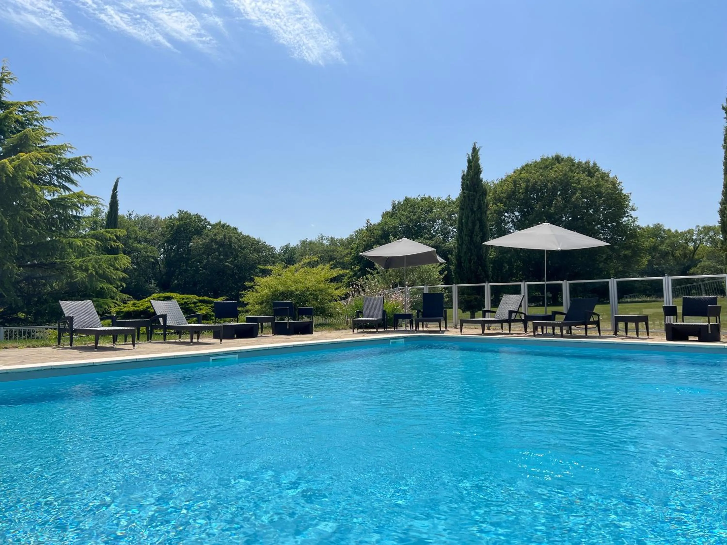 Swimming pool in Best Western Le Bois de la Marche