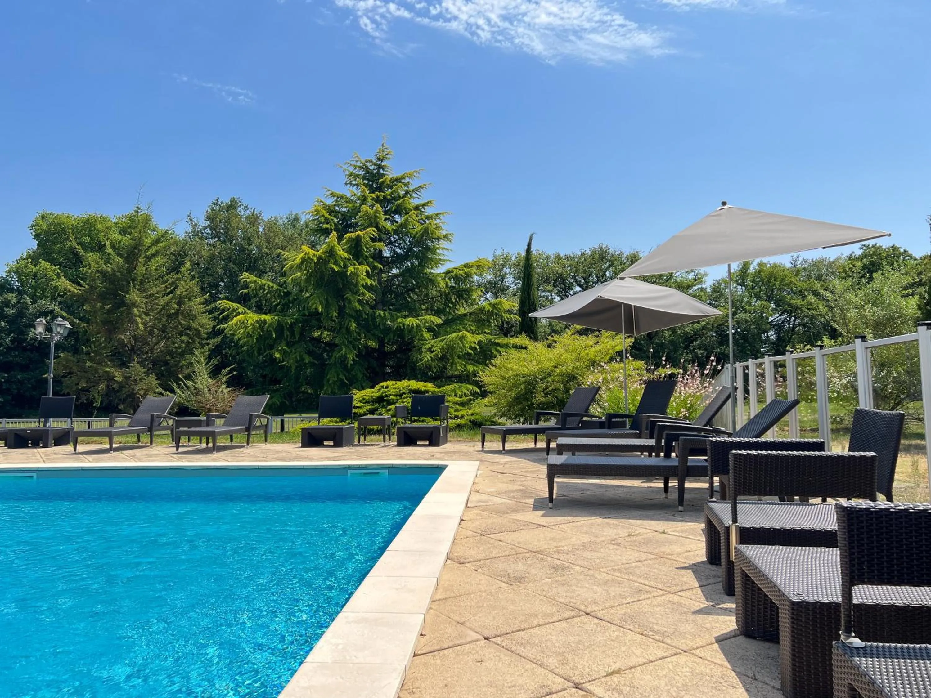 Swimming pool in Best Western Le Bois de la Marche