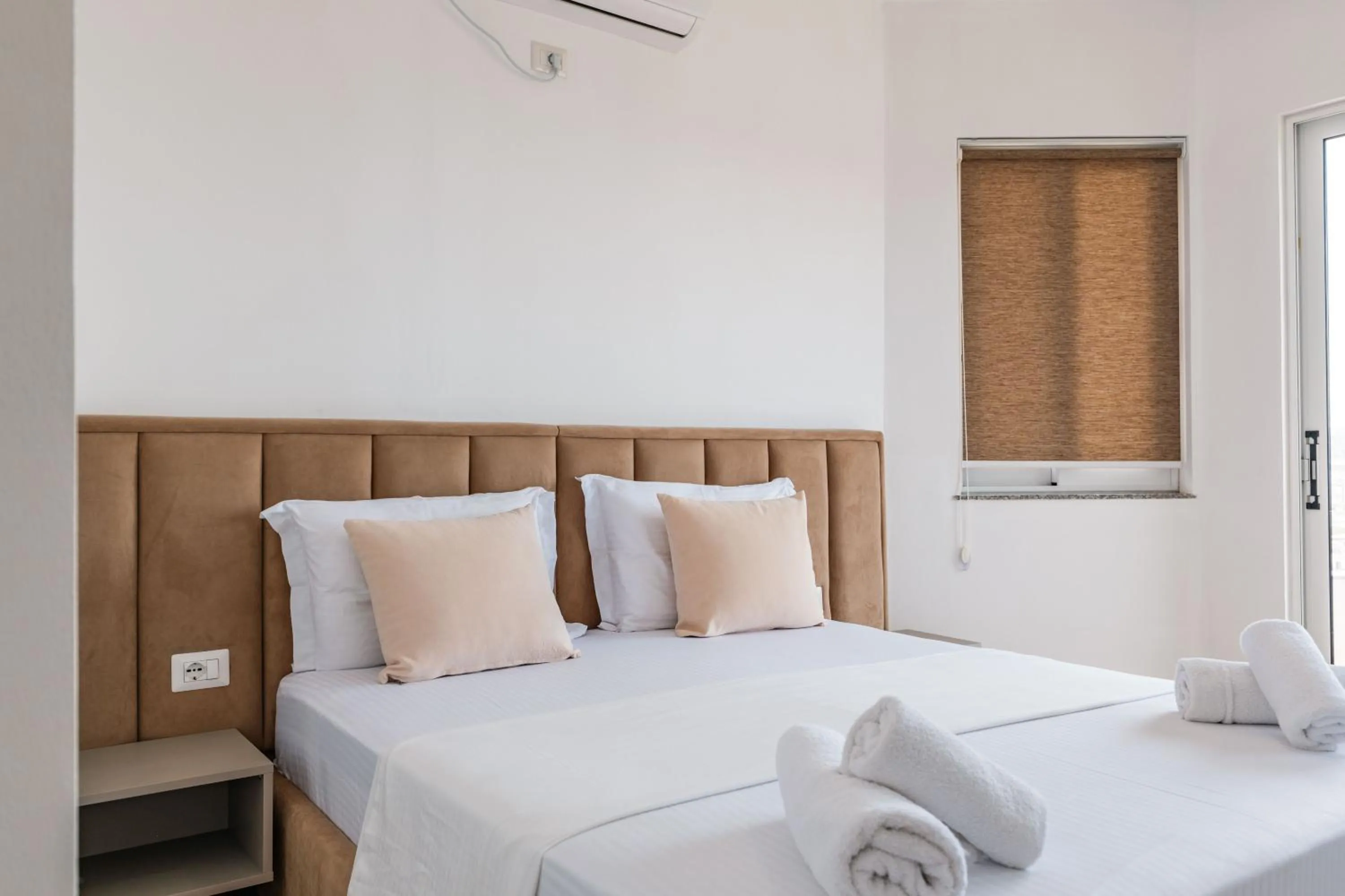 Bed in Sunshine Hotel