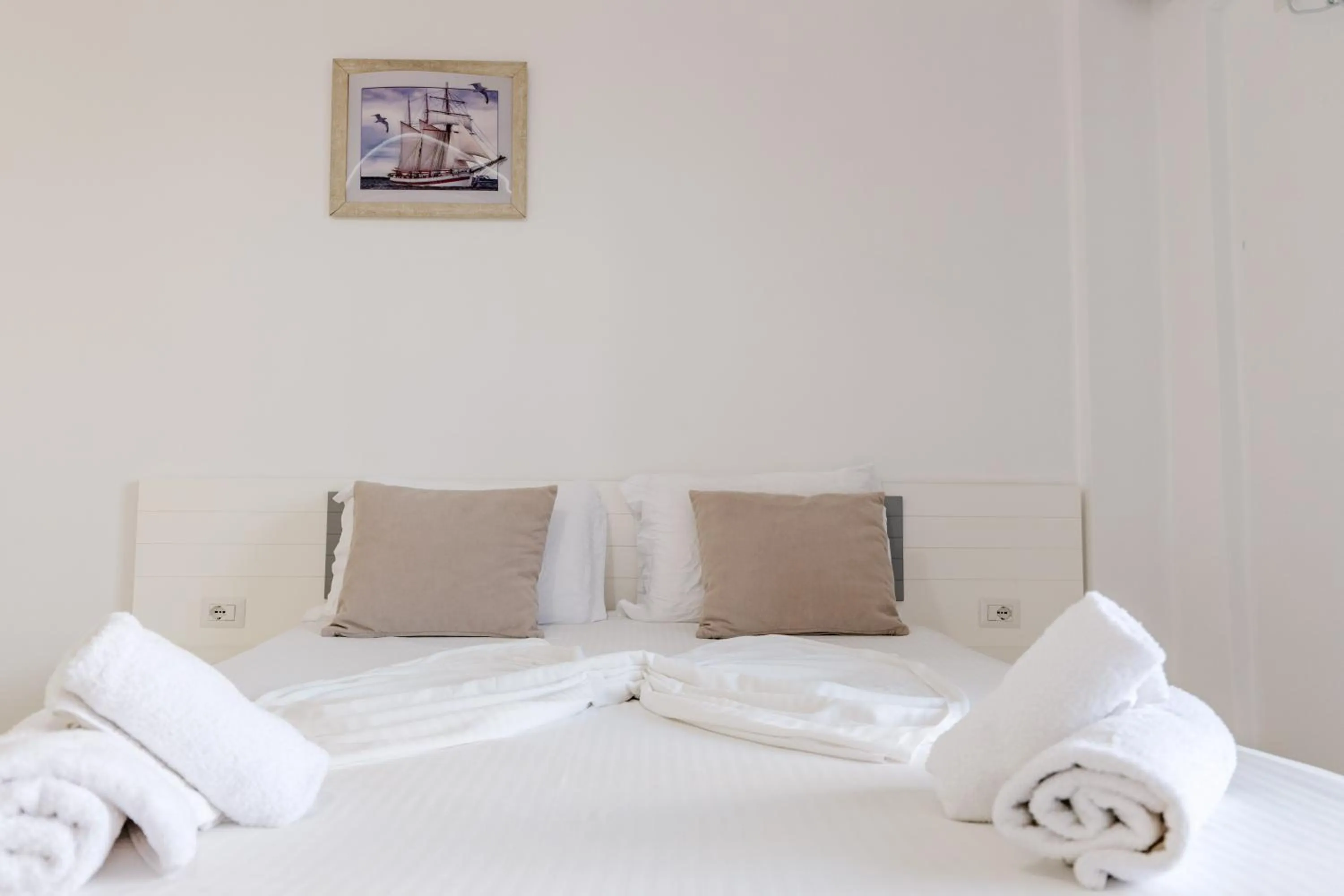 Bed in Sunshine Hotel