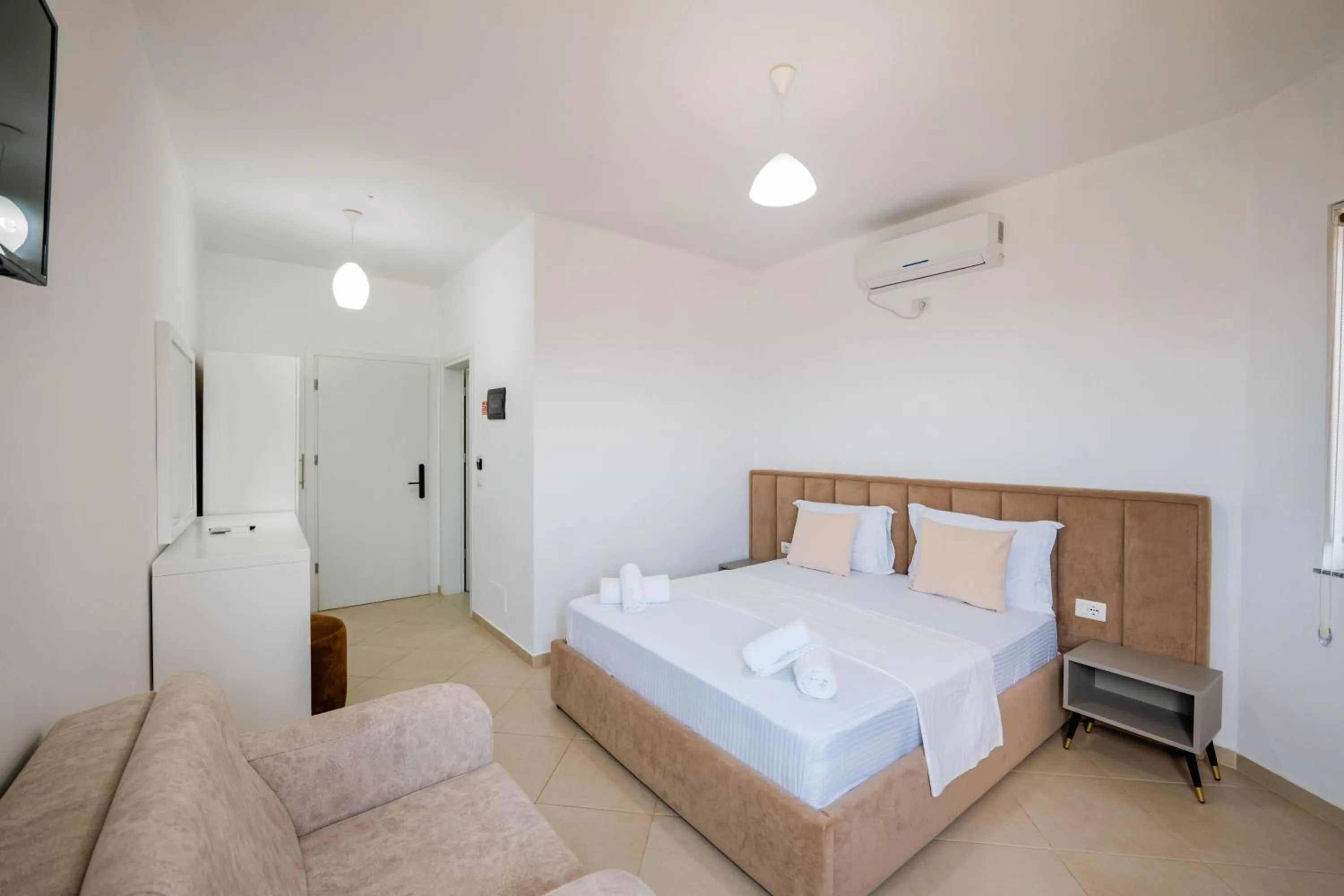 Bed in Sunshine Hotel