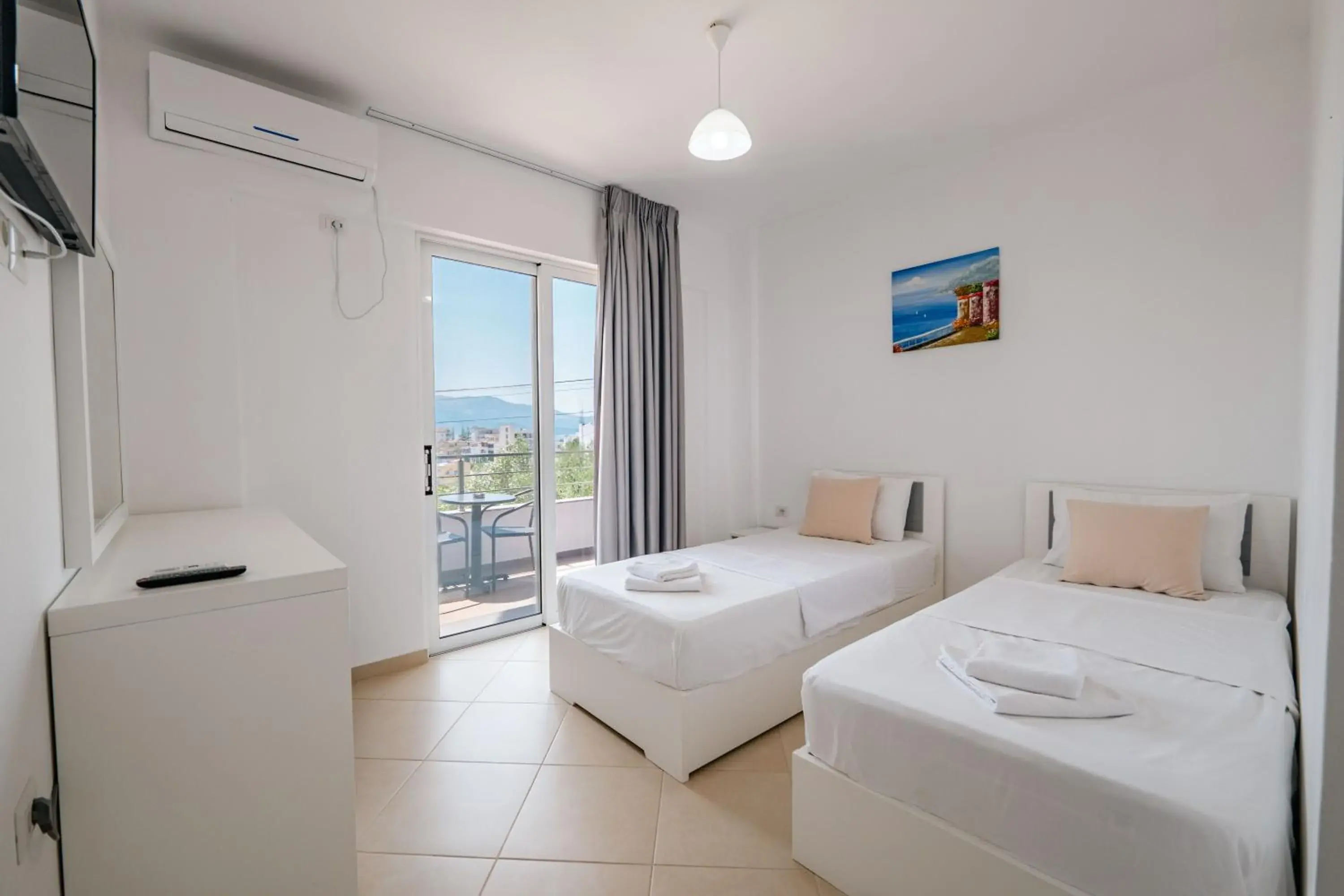 Twin Room with Balcony in Sunshine Hotel Twin Room with Balcony in Sunshine Hotel