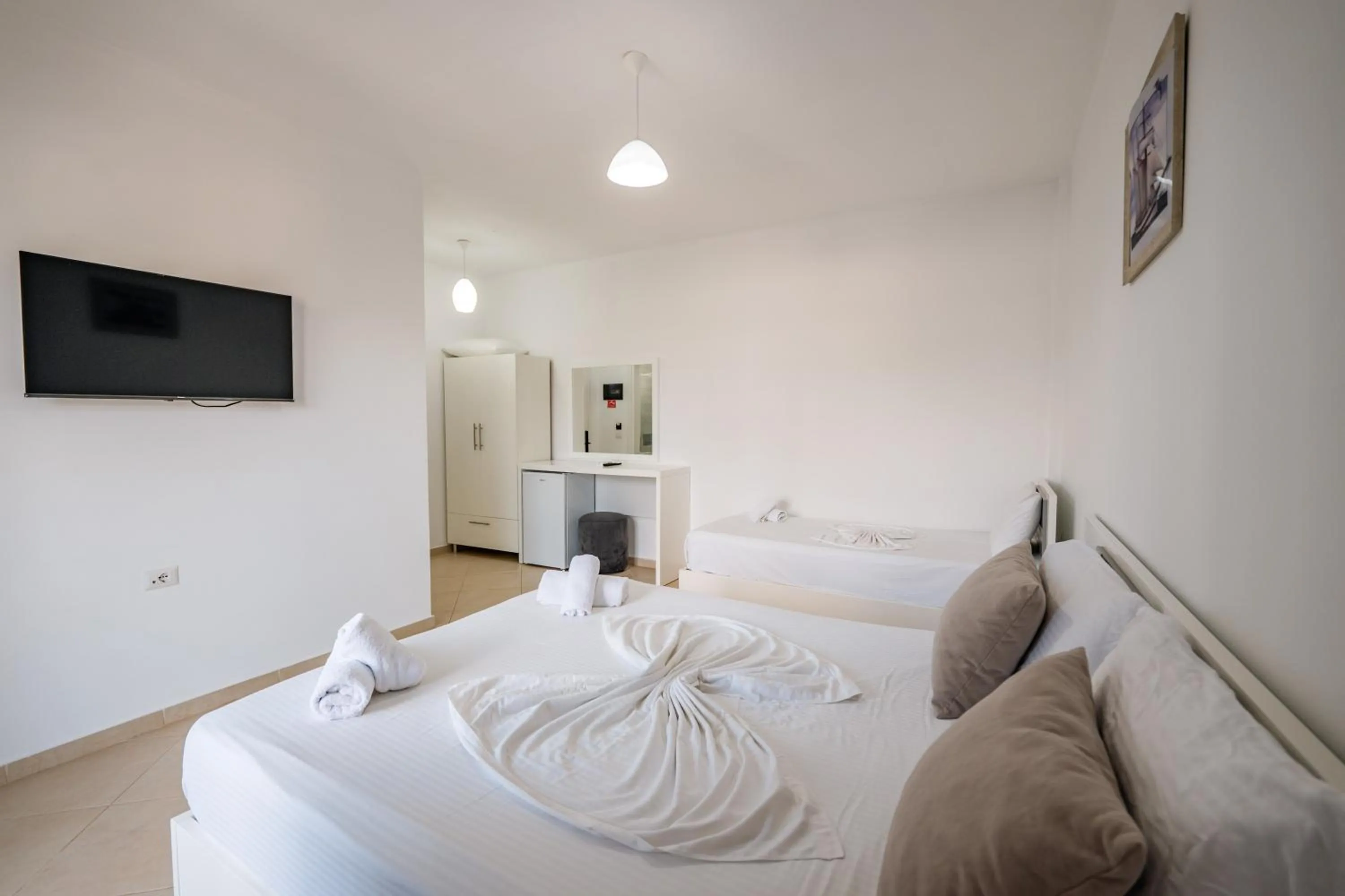 Bed in Sunshine Hotel