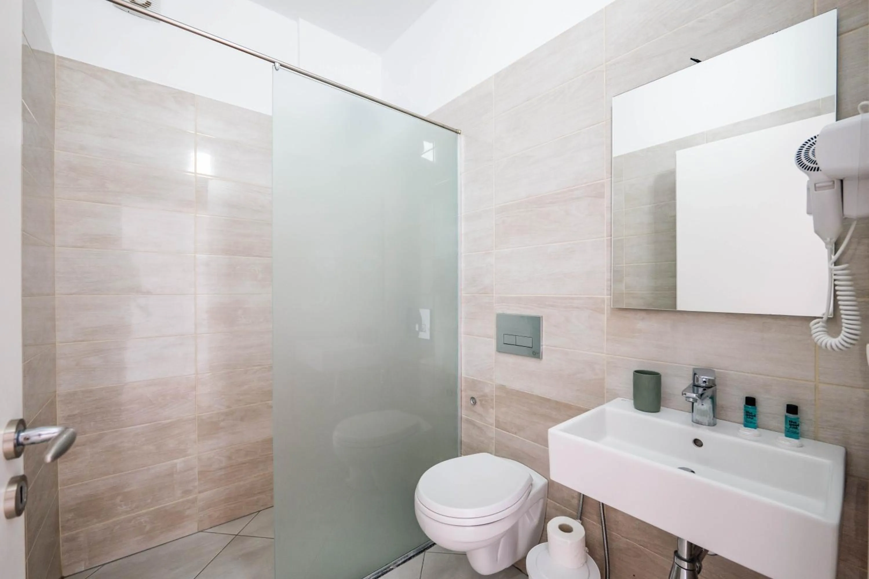 Toilet in Sunshine Hotel