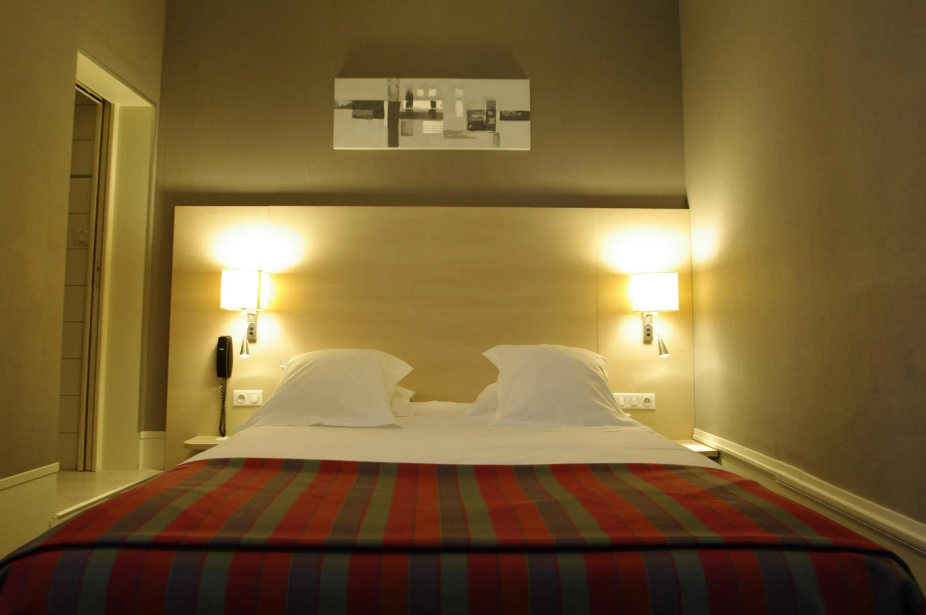 Bed in Grand Hotel de L'Univers