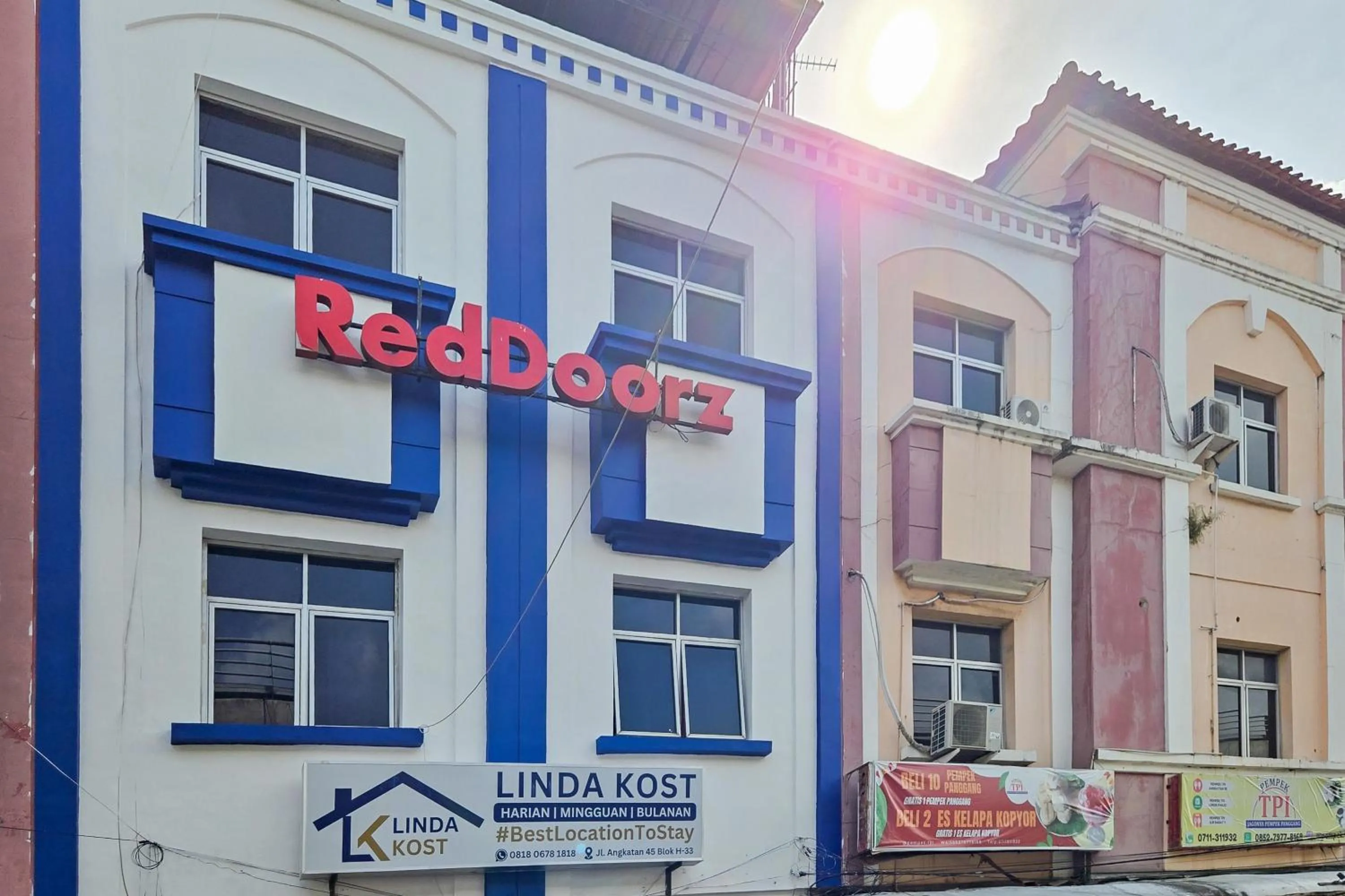 Facade/entrance in RedDoorz near Palembang Square Mall 2