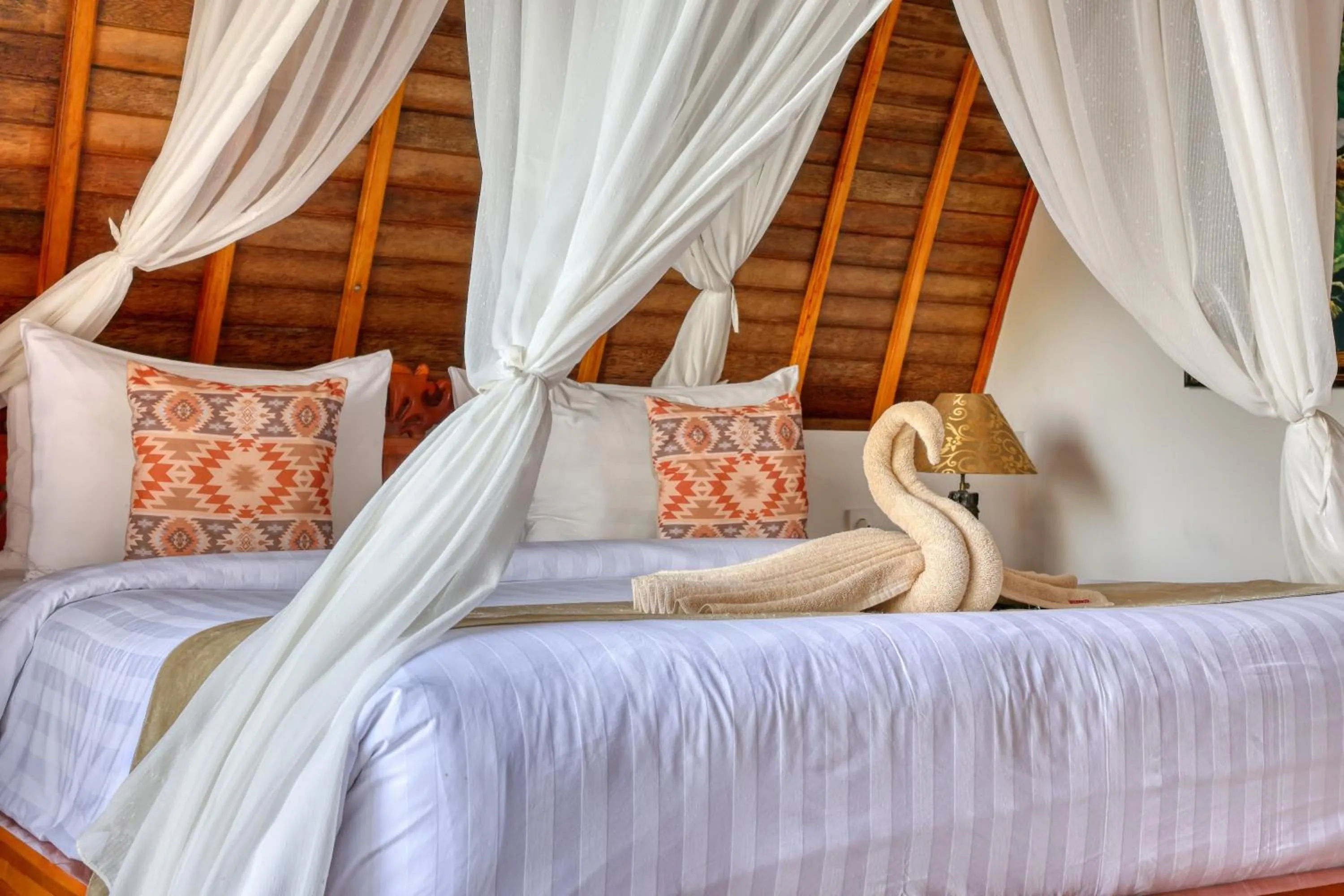 Bed in Bagia Bungalows