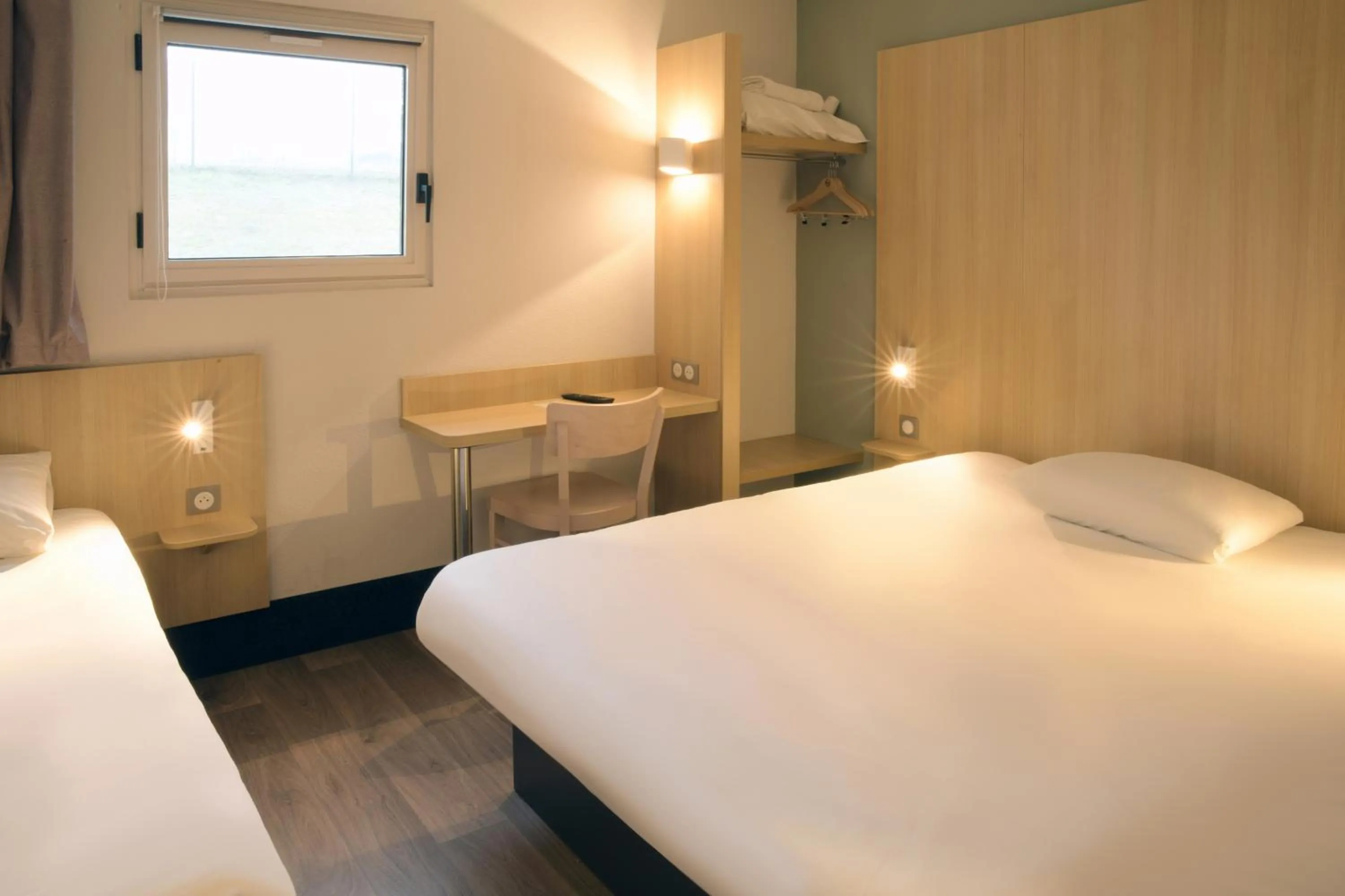 Photo of the whole room, Bed in B&B HOTEL Angoulême