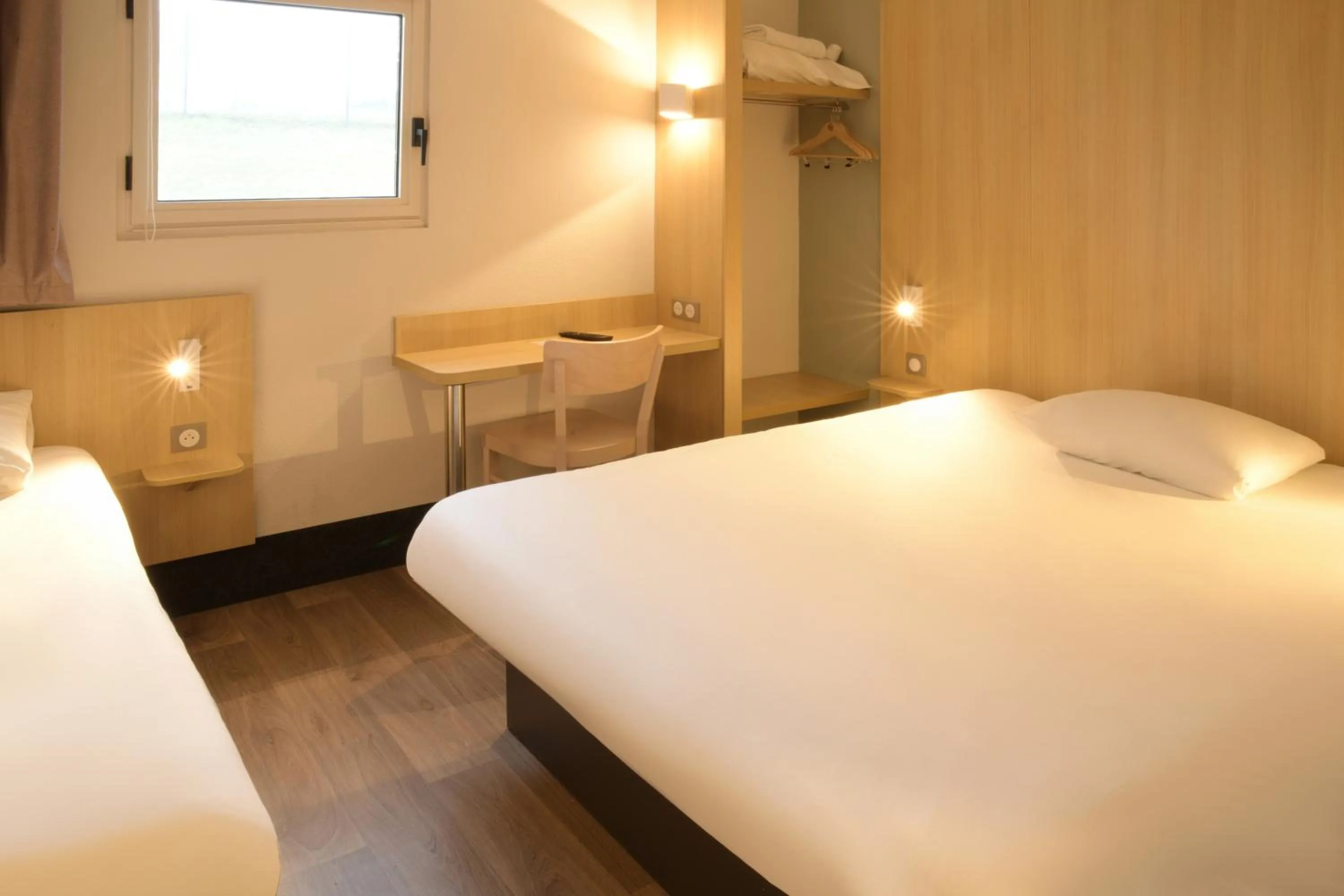 Photo of the whole room, Bed in B&B HOTEL Angoulême