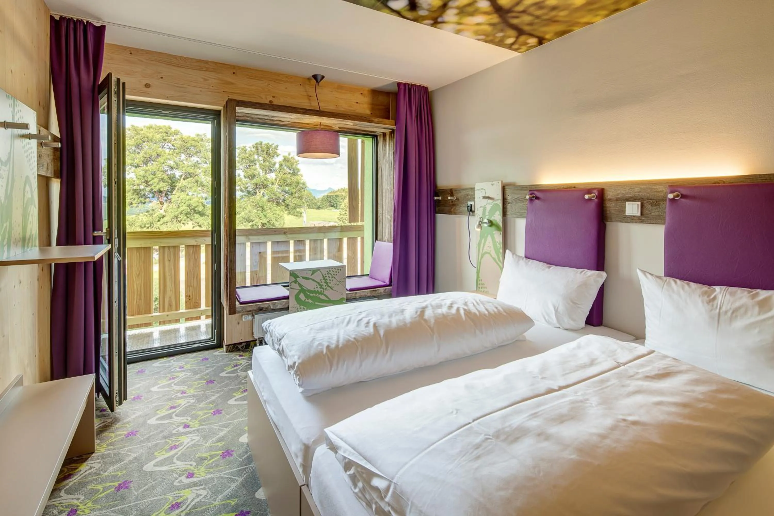 Photo of the whole room, Bed in Explorer Hotel Bad Kleinkirchheim