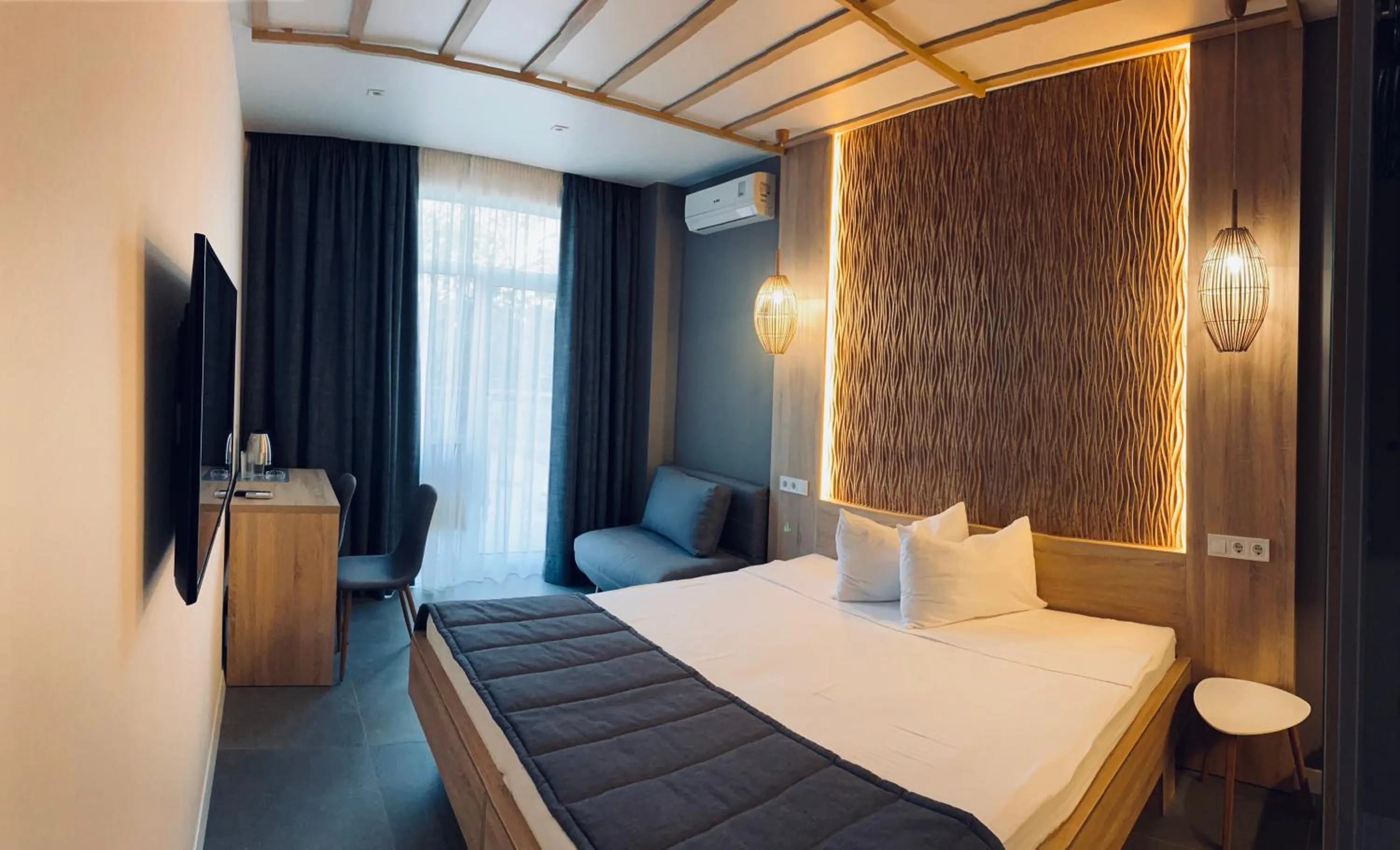 Bed in Mykonos Hotel Apart - Maestro