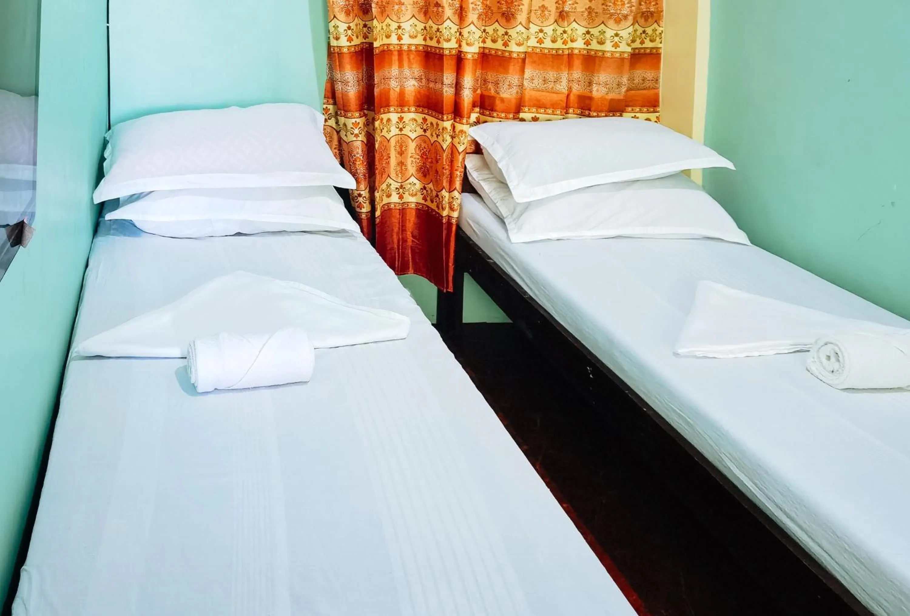 Bed in RedDoorz at D128 Lodge Cagayan Valley