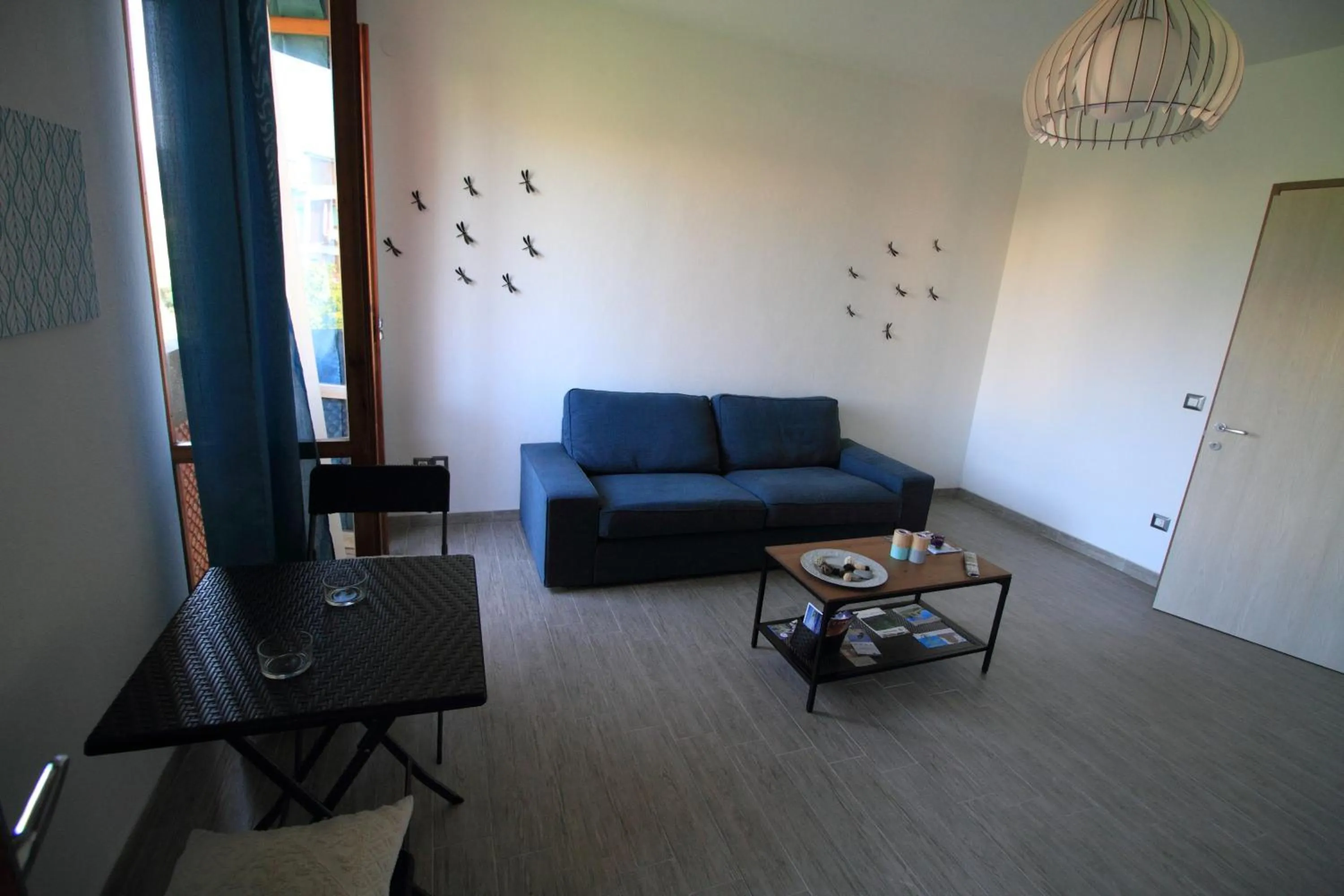 Communal lounge/ TV room in B&B Libellula