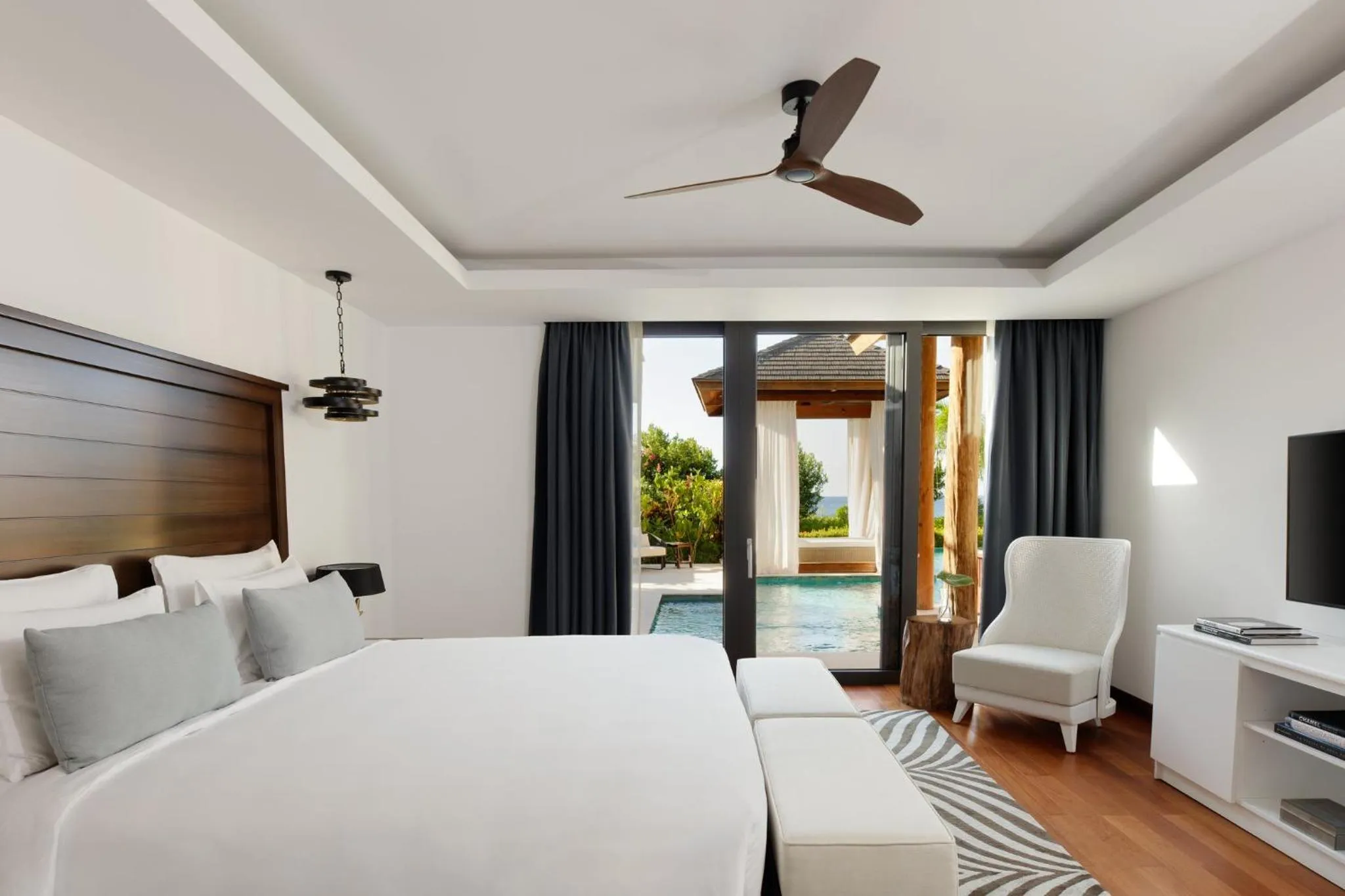 Photo of the whole room, Bed in InterContinental Dominica Cabrits Resort & Spa by IHG