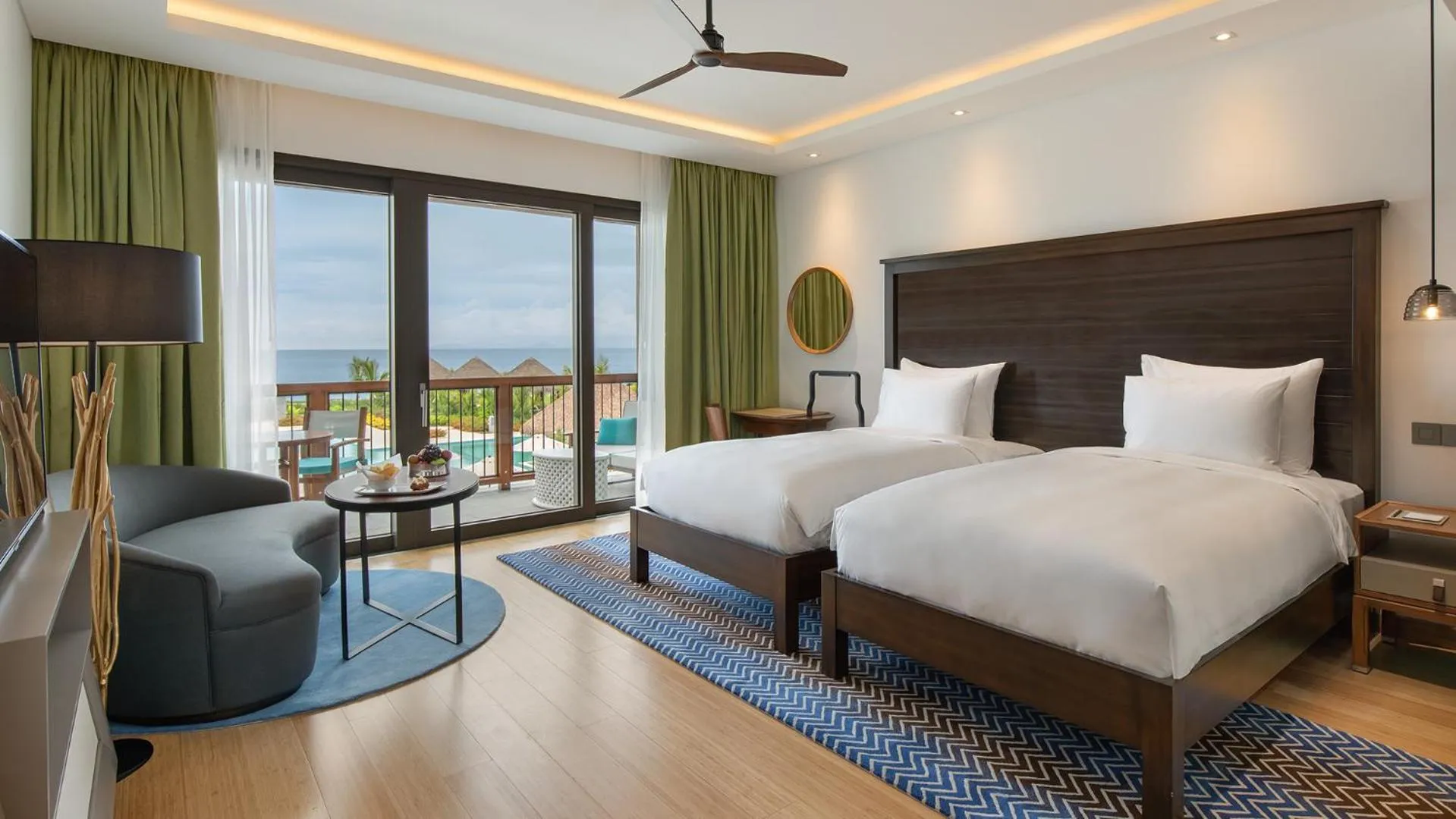 Photo of the whole room, Bed in InterContinental Dominica Cabrits Resort & Spa by IHG