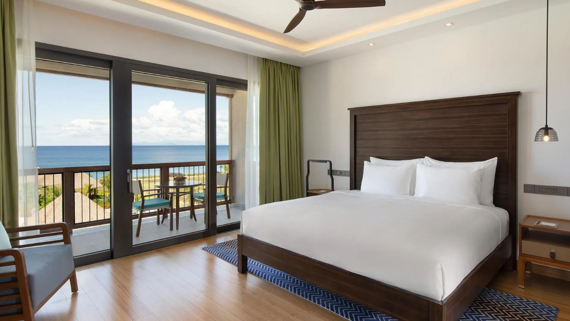 Photo of the whole room, Bed in InterContinental Dominica Cabrits Resort & Spa by IHG