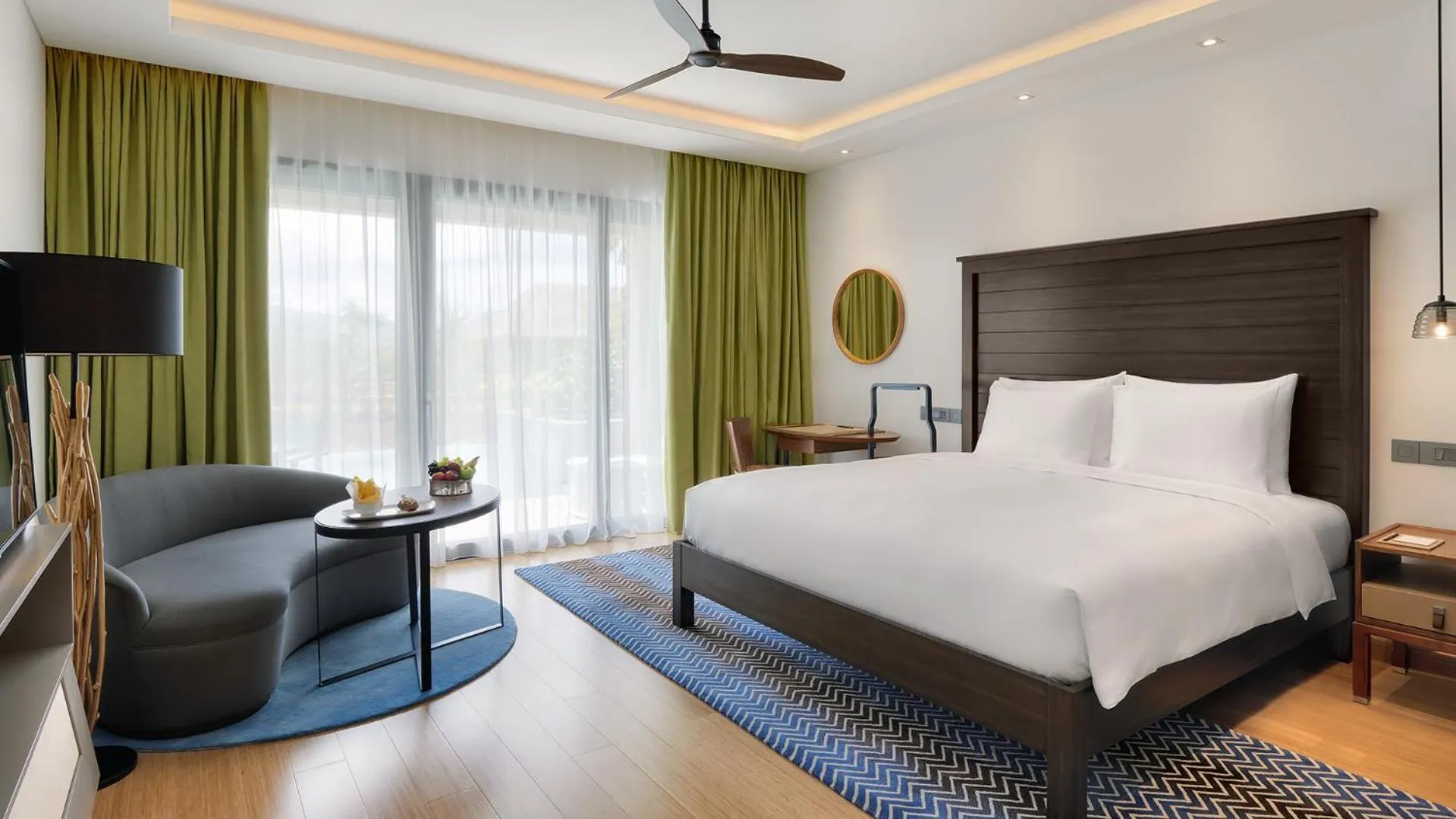 Seating area, Bed in InterContinental Dominica Cabrits Resort & Spa by IHG