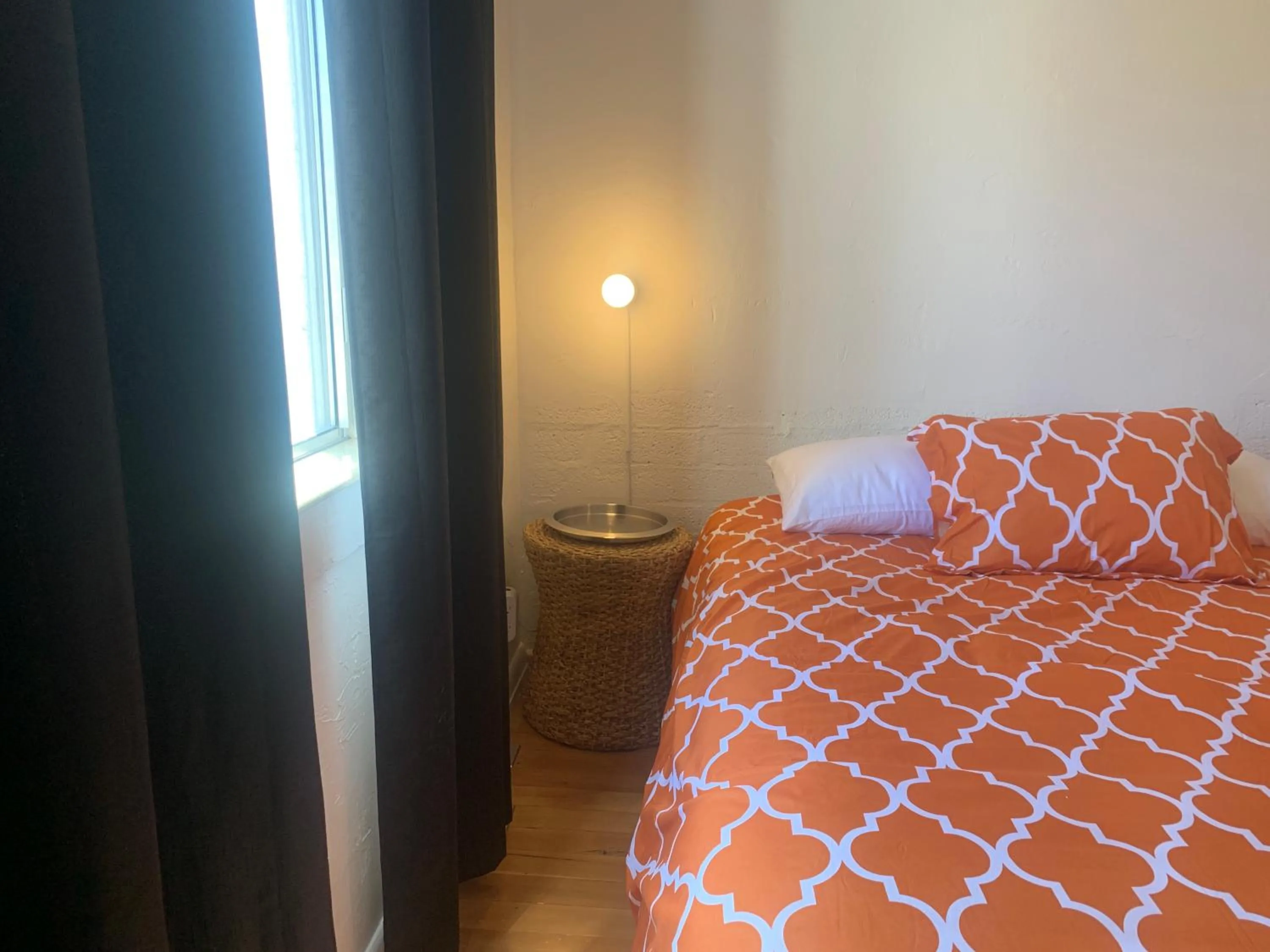 Bed in Dragonfly Motor Lodge