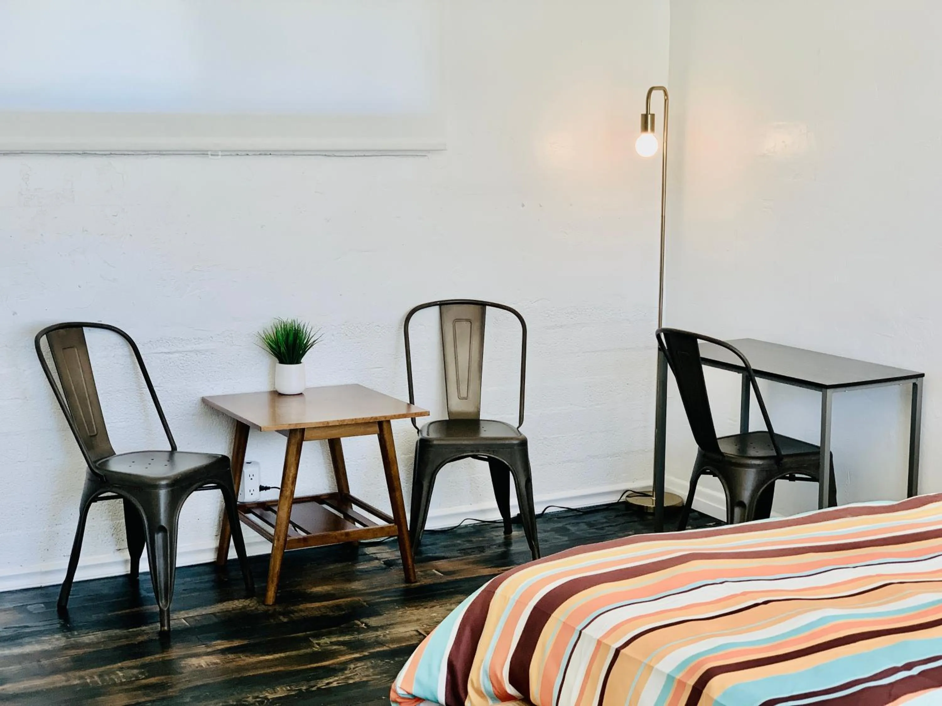 Bed in Dragonfly Motor Lodge