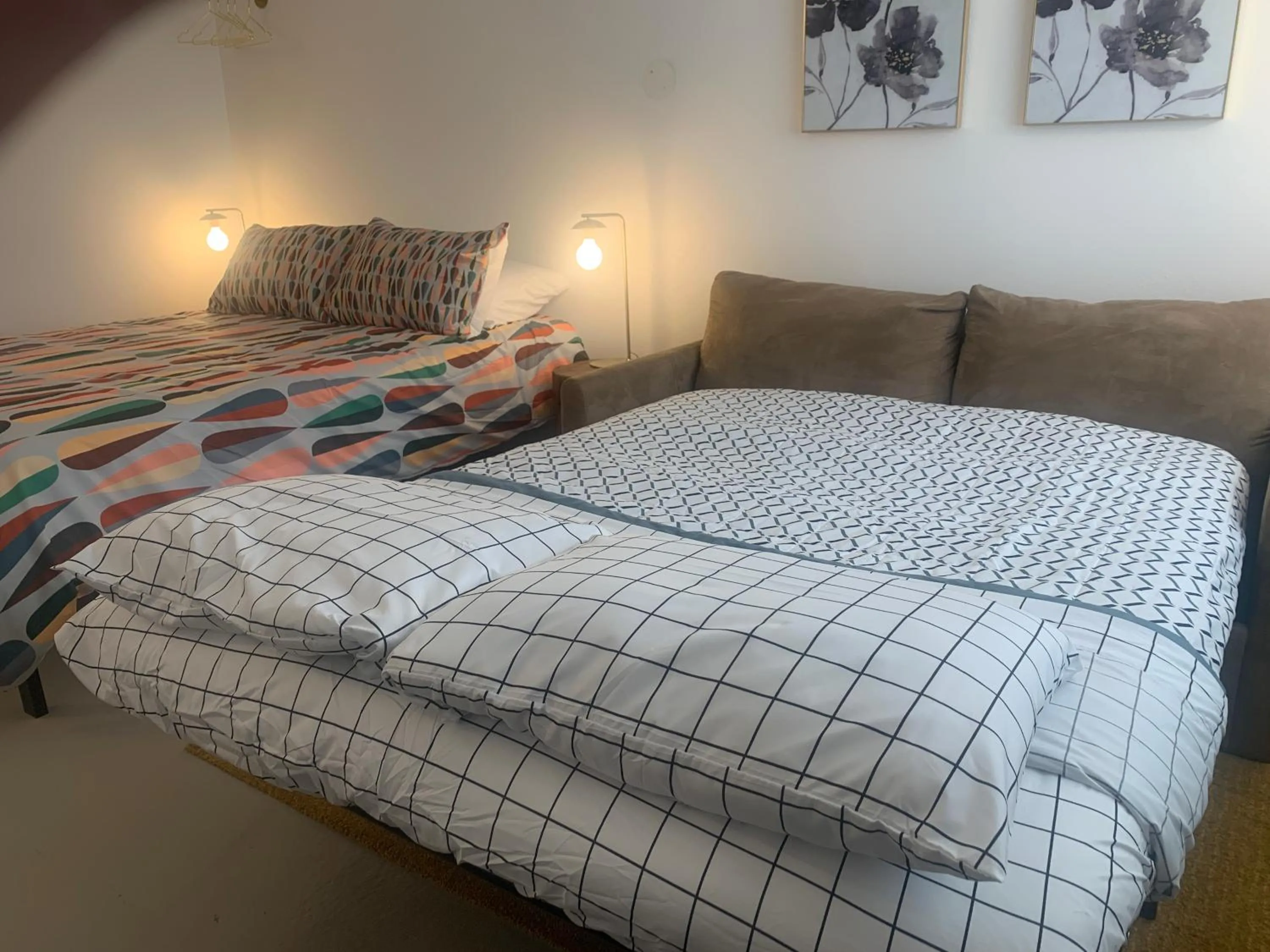 Bed in Dragonfly Motor Lodge