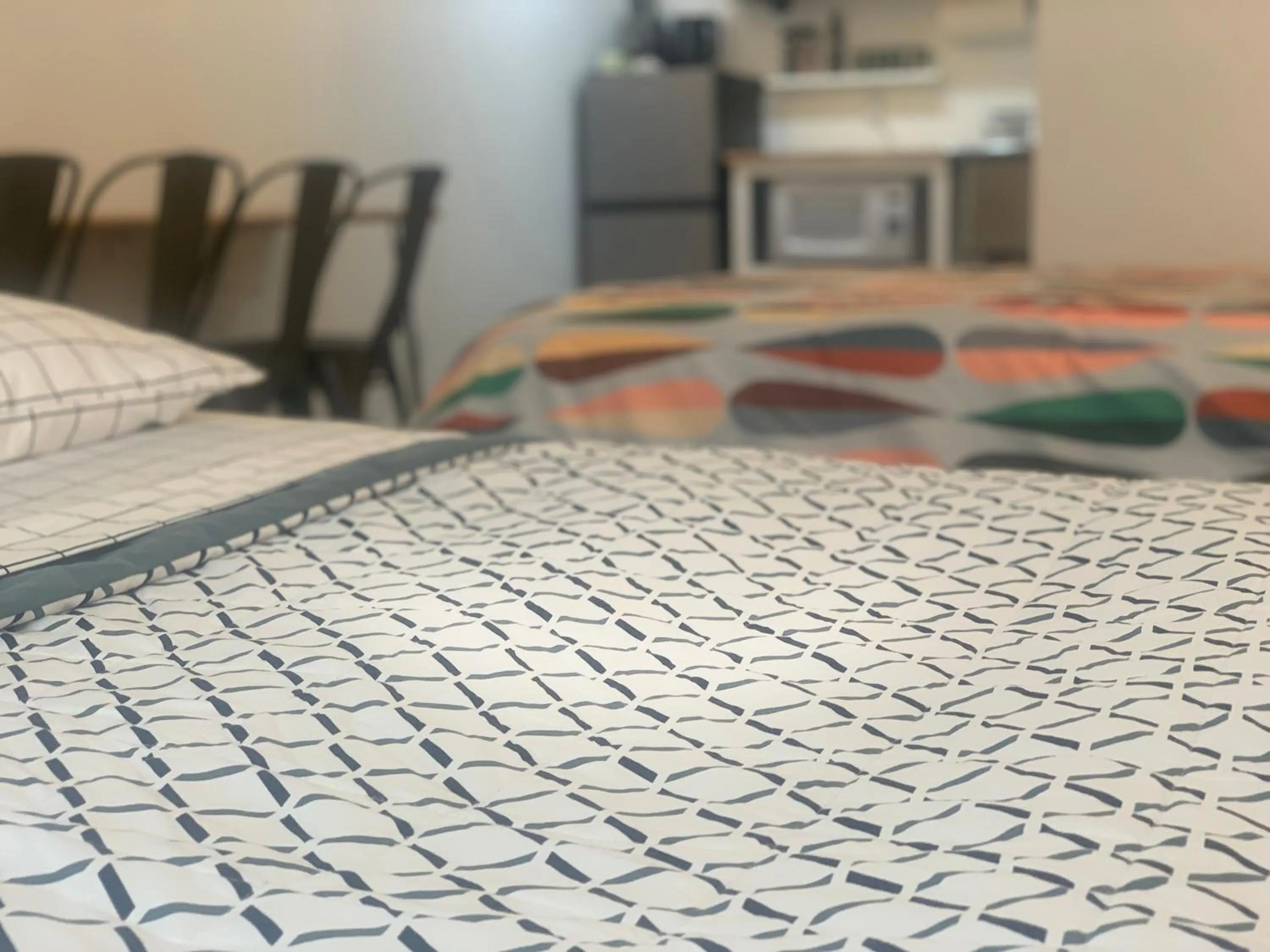 Bed in Dragonfly Motor Lodge