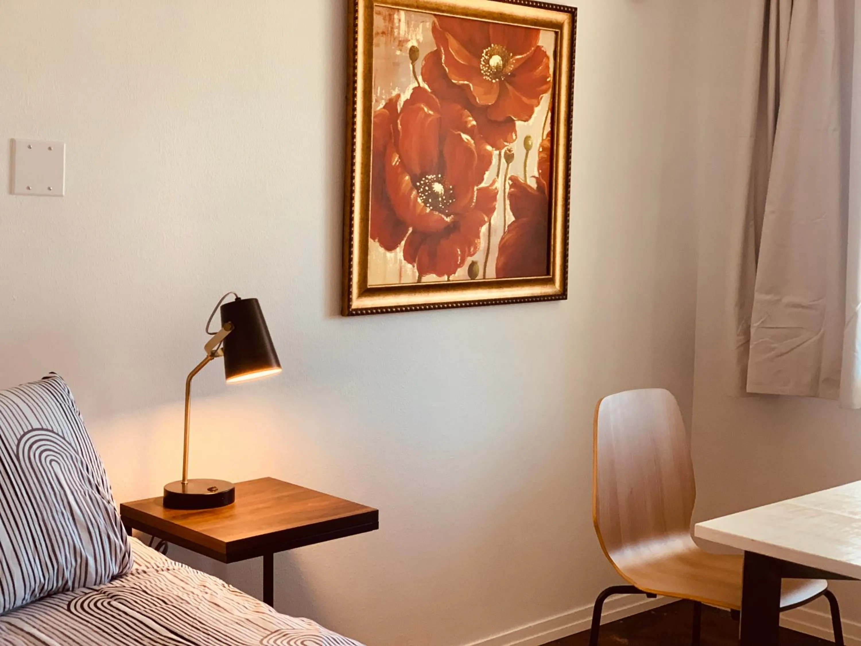 Bed in Dragonfly Motor Lodge