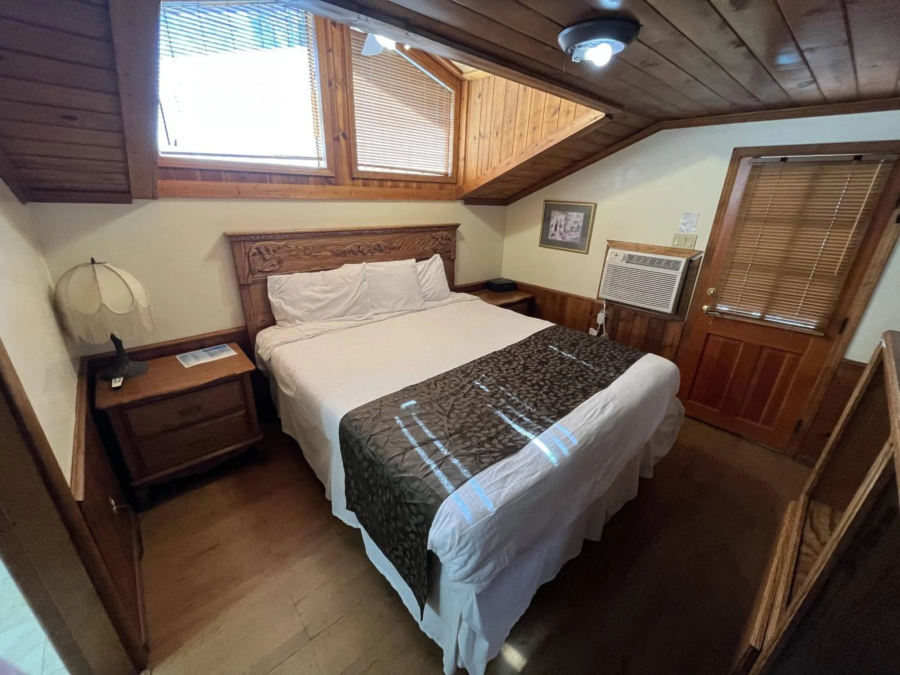 Bed in Whispering Pines Lodge