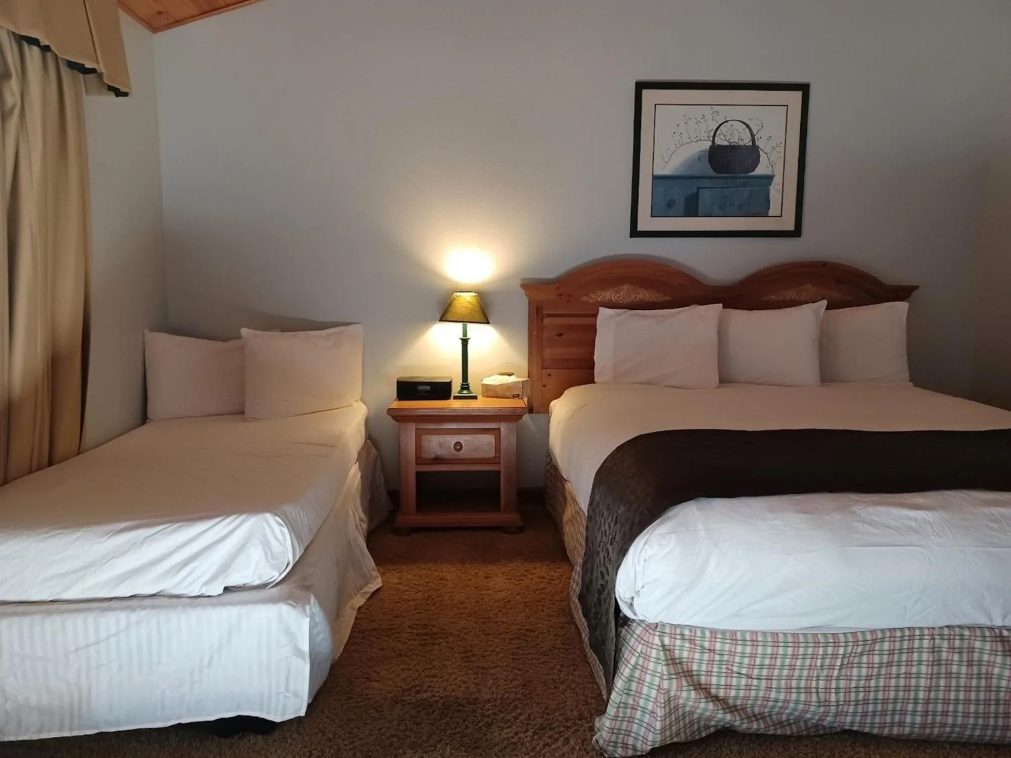 Bed in Whispering Pines Lodge