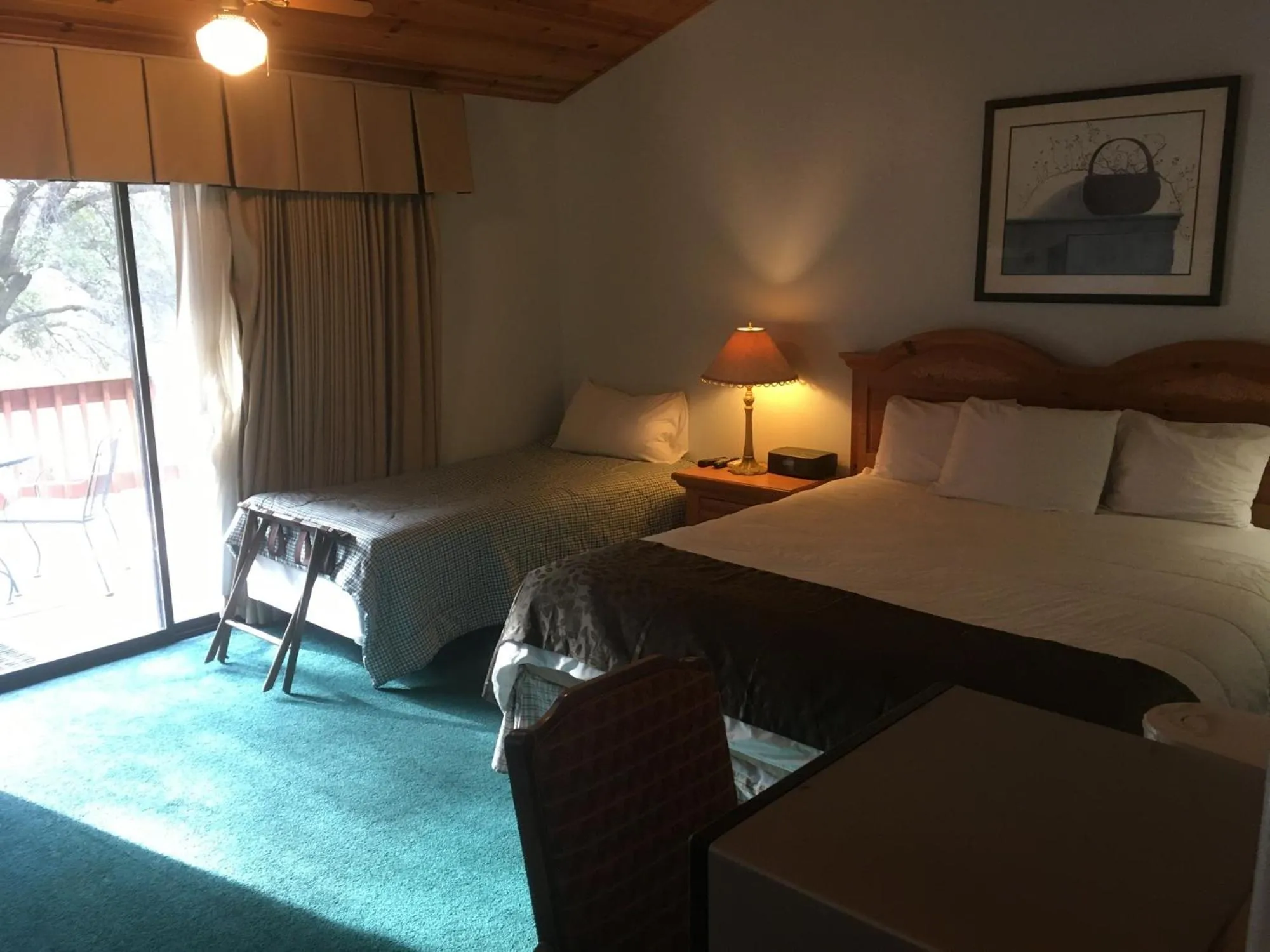 Bed in Whispering Pines Lodge