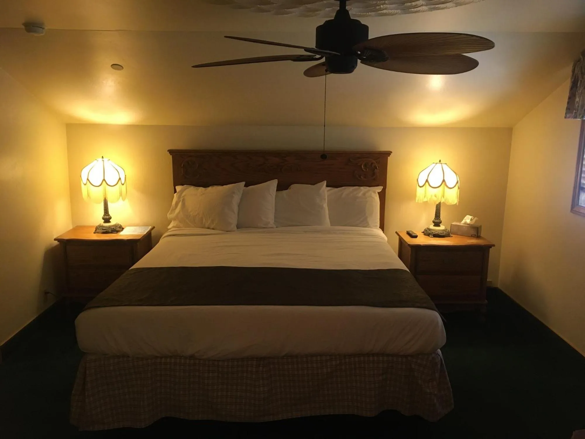 Bed in Whispering Pines Lodge