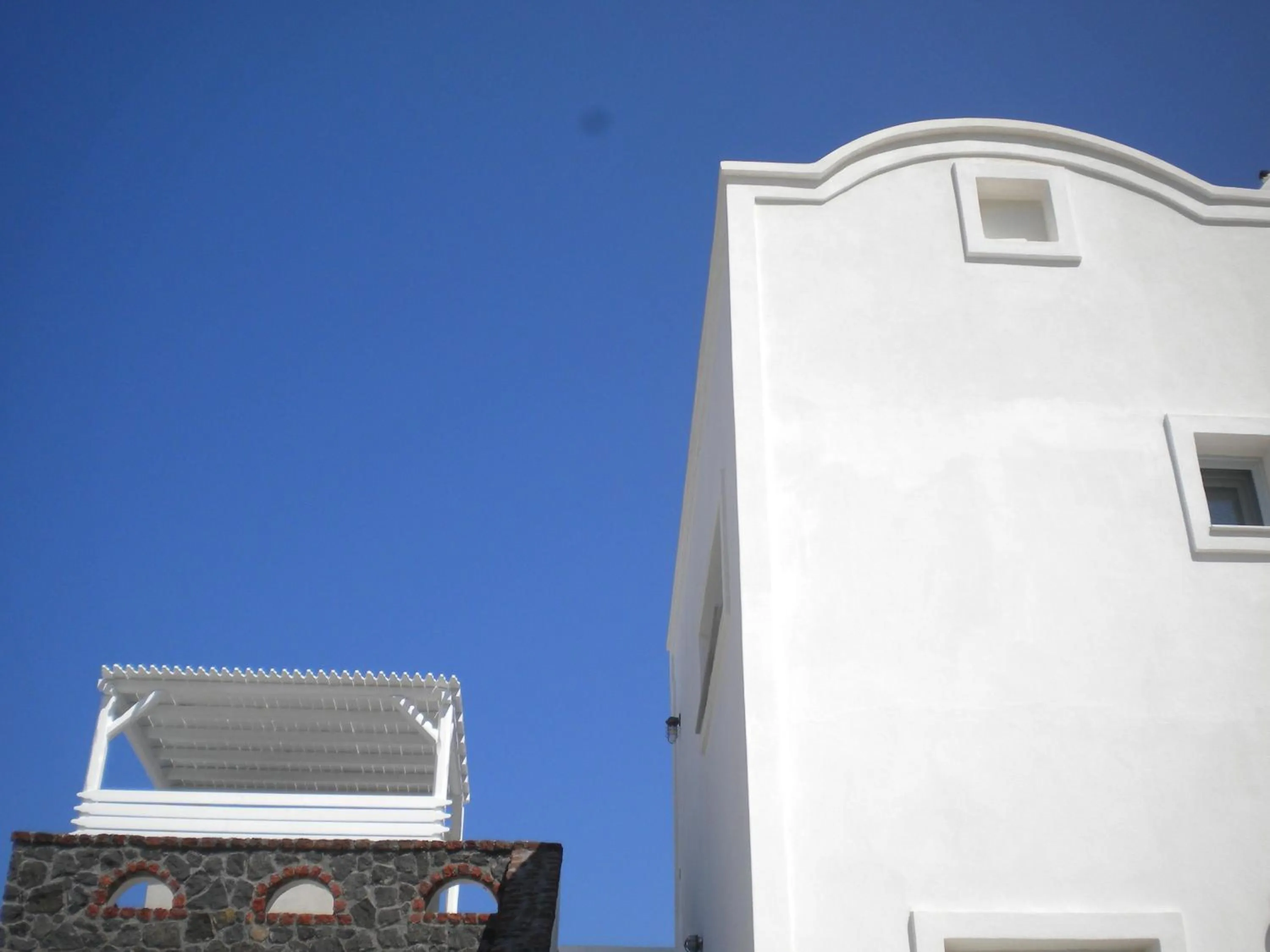 Property building in Starlight Luxury Seaside Villa & Suites