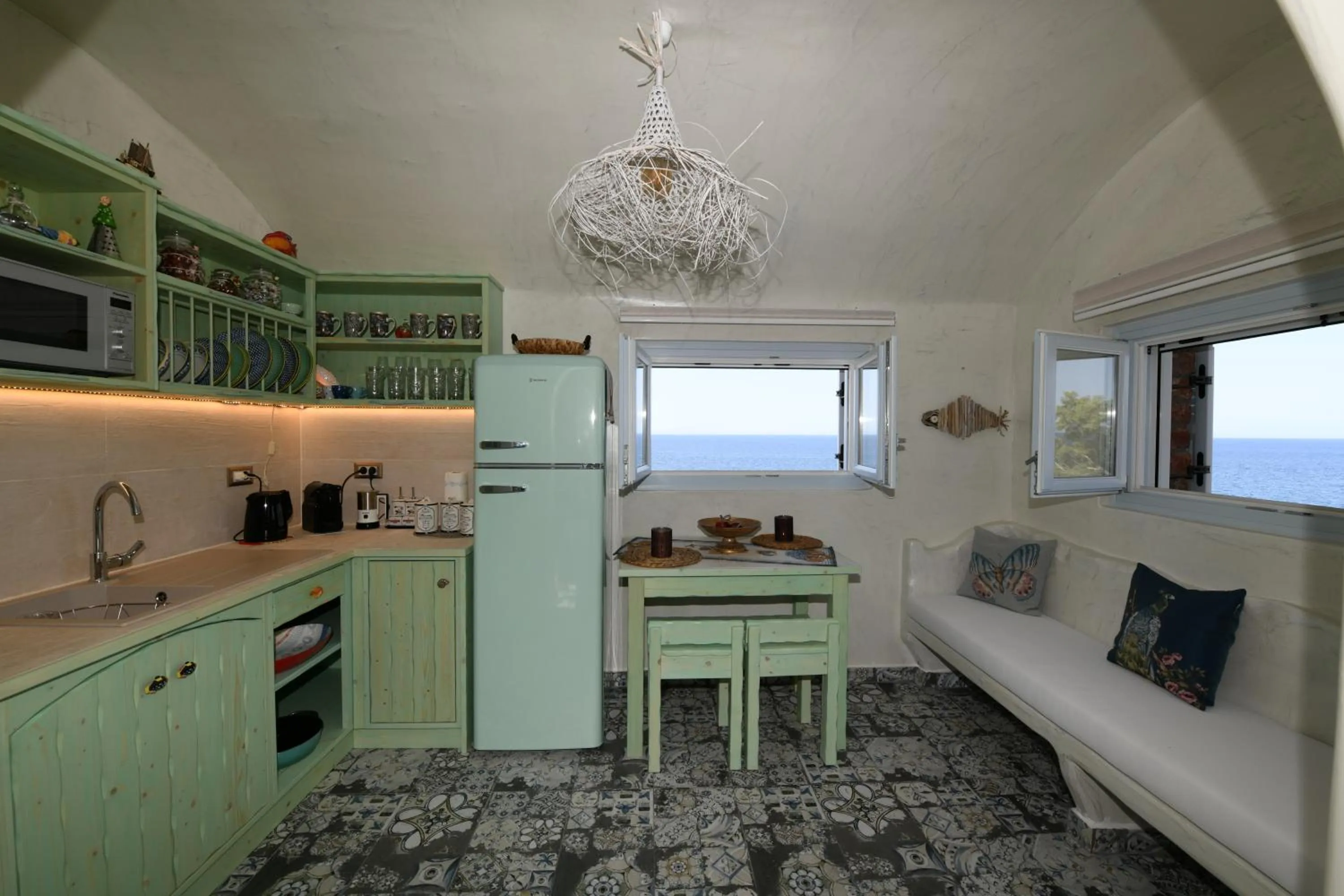 Kitchen or kitchenette in Starlight Luxury Seaside Villa & Suites