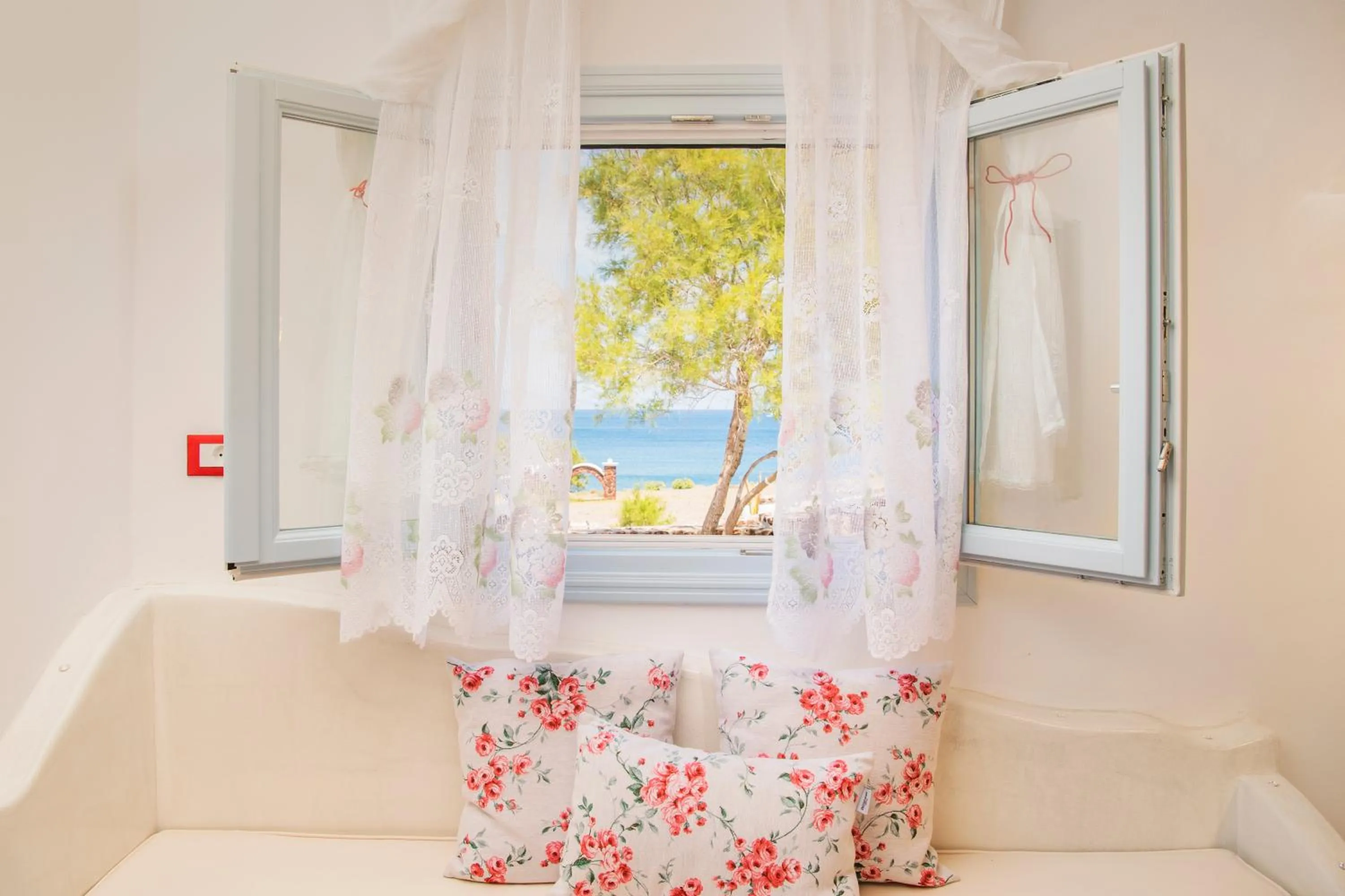 Living room, Bed in Starlight Luxury Seaside Villa & Suites