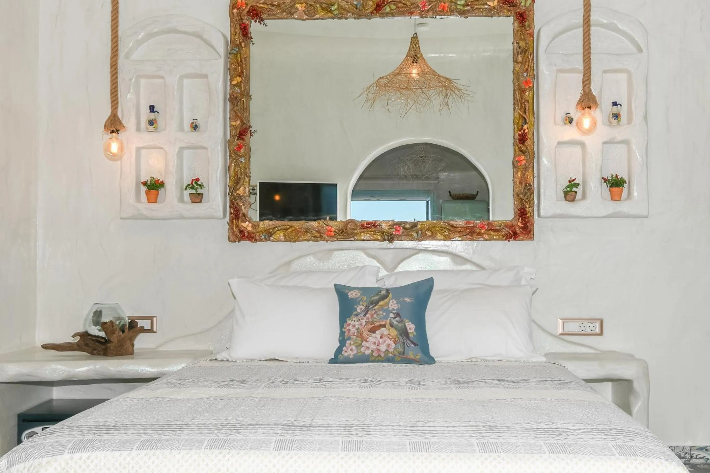 Bed in Starlight Luxury Seaside Villa & Suites