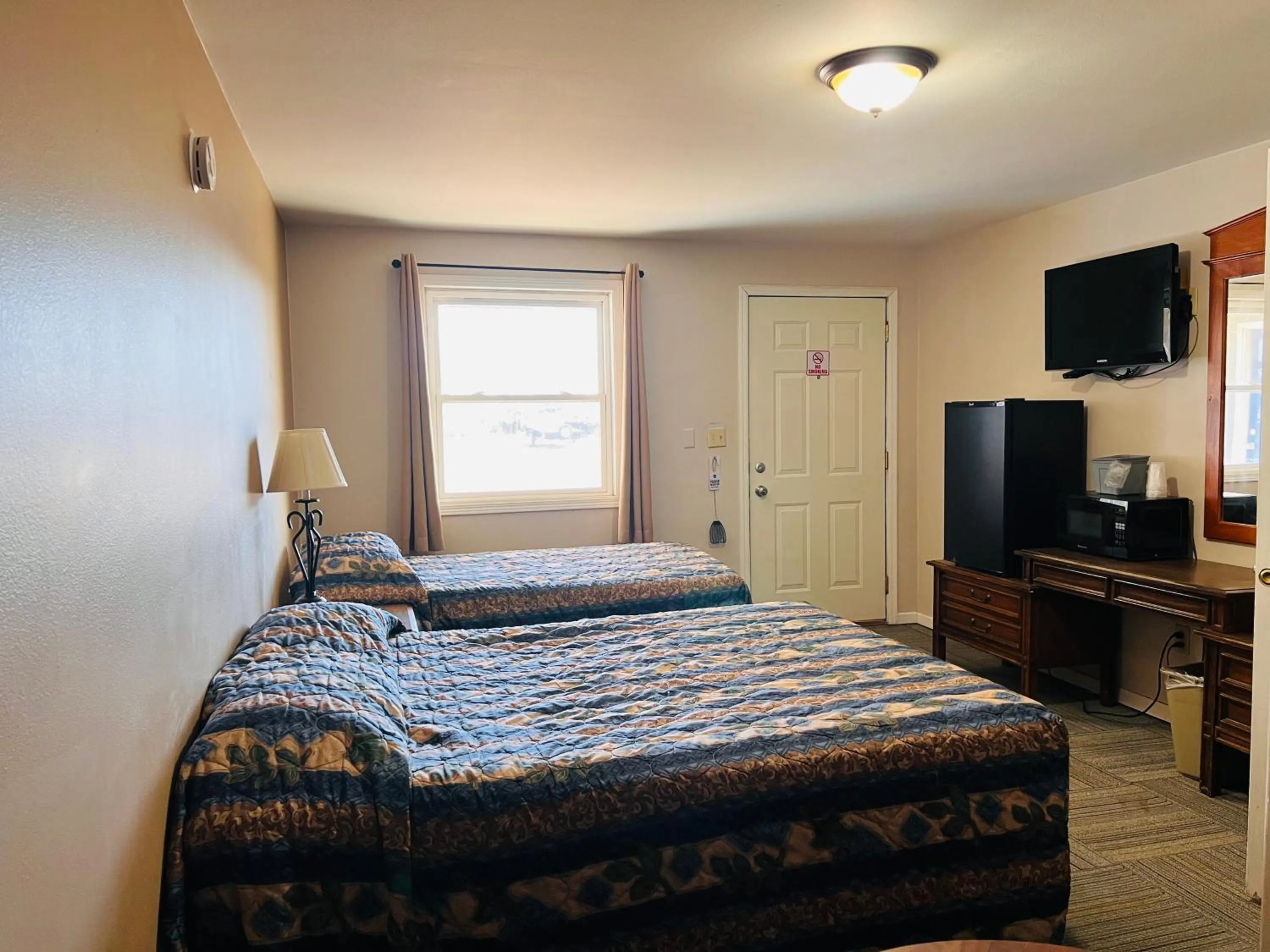 Bedroom, Bed in Dew Drop Inn Motel by OYO Miller SD