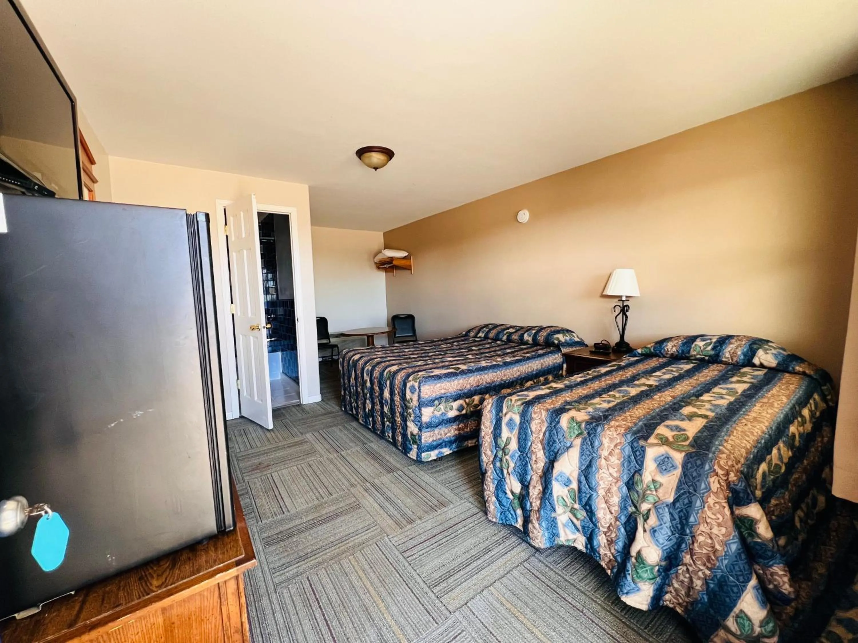 Bedroom, Bed in Dew Drop Inn Motel by OYO Miller SD