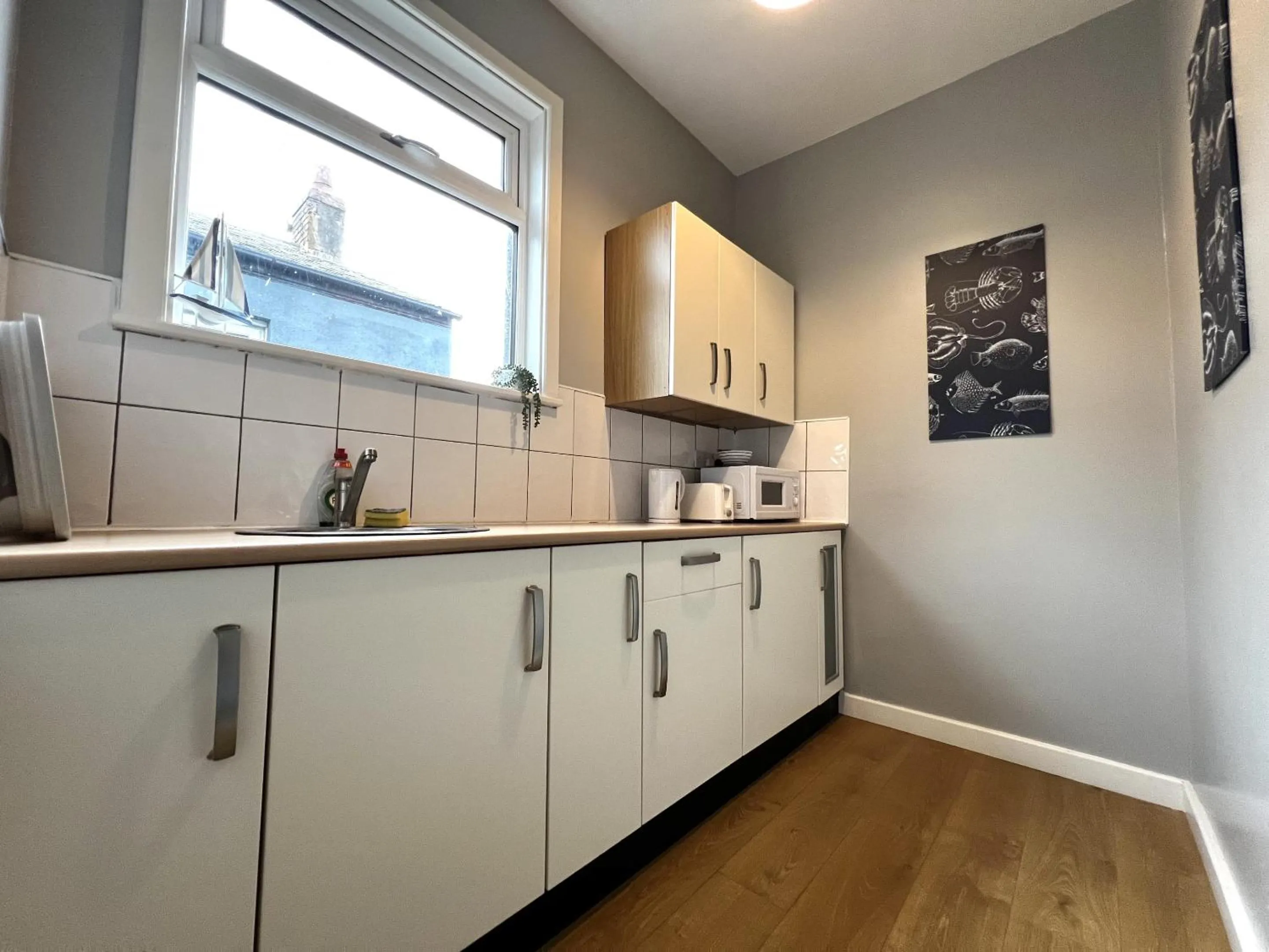 Kitchen or kitchenette in Central Cove Guesthouse