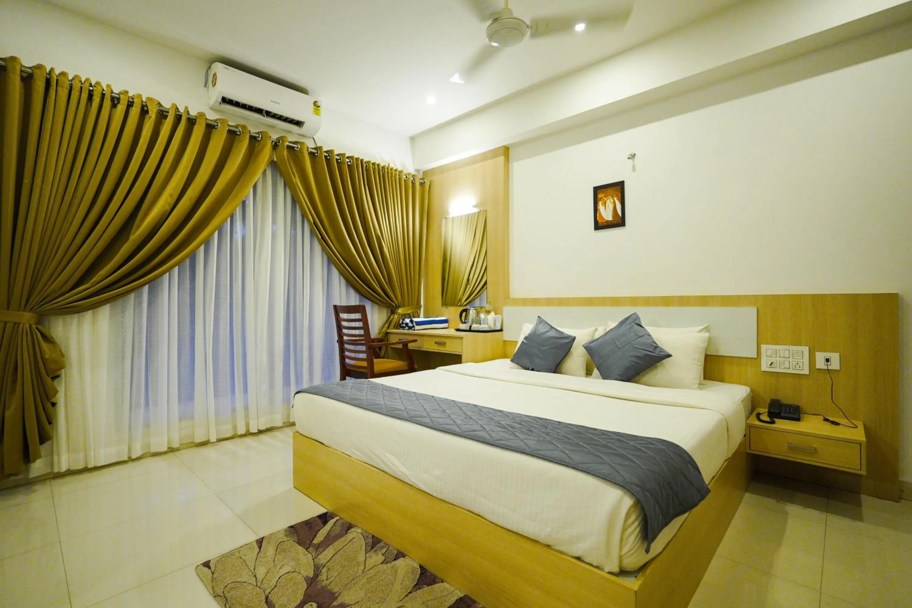 Bed in Athirappilly Rainland Resort
