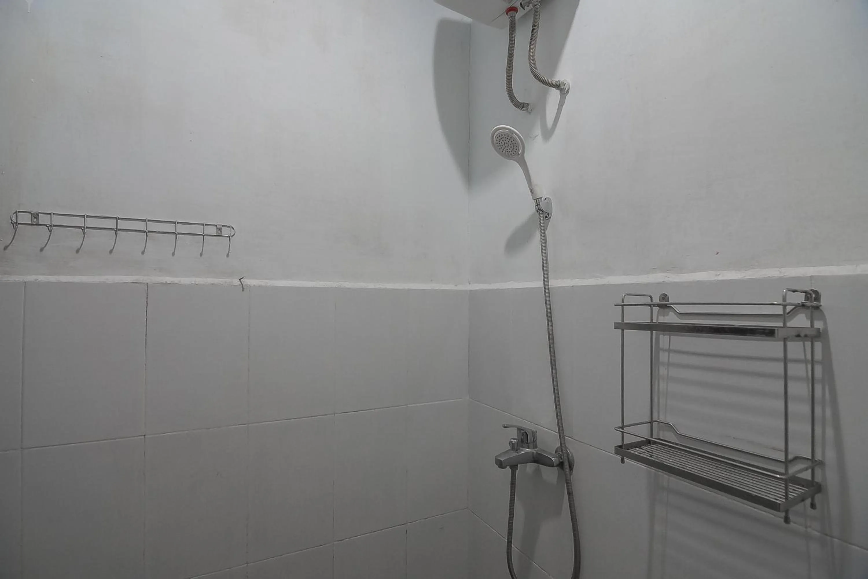 Bathroom in RedDoorz Plus near Cambridge City Square 2 Medan