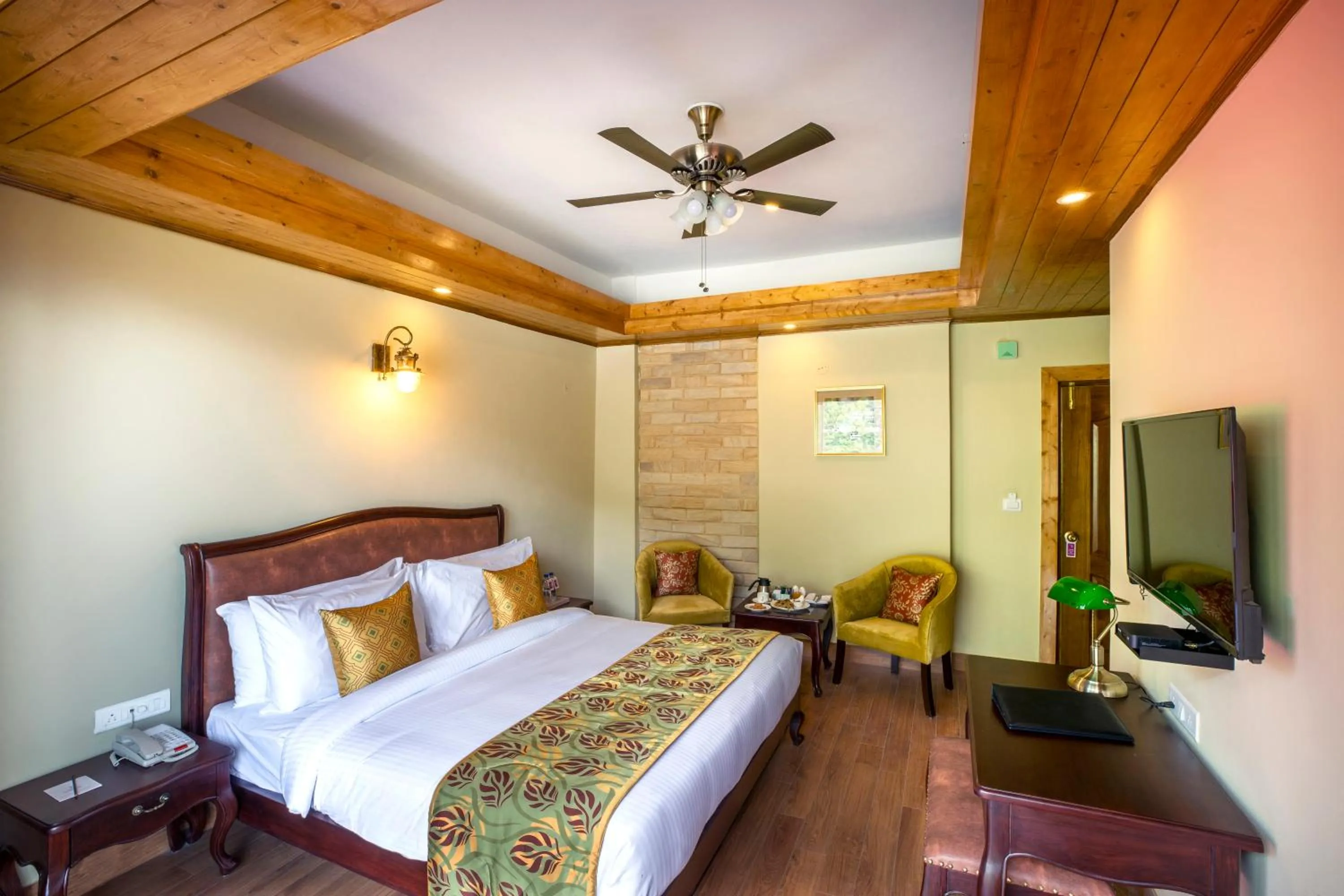Bed in Regenta Inn by Riverside Manali
