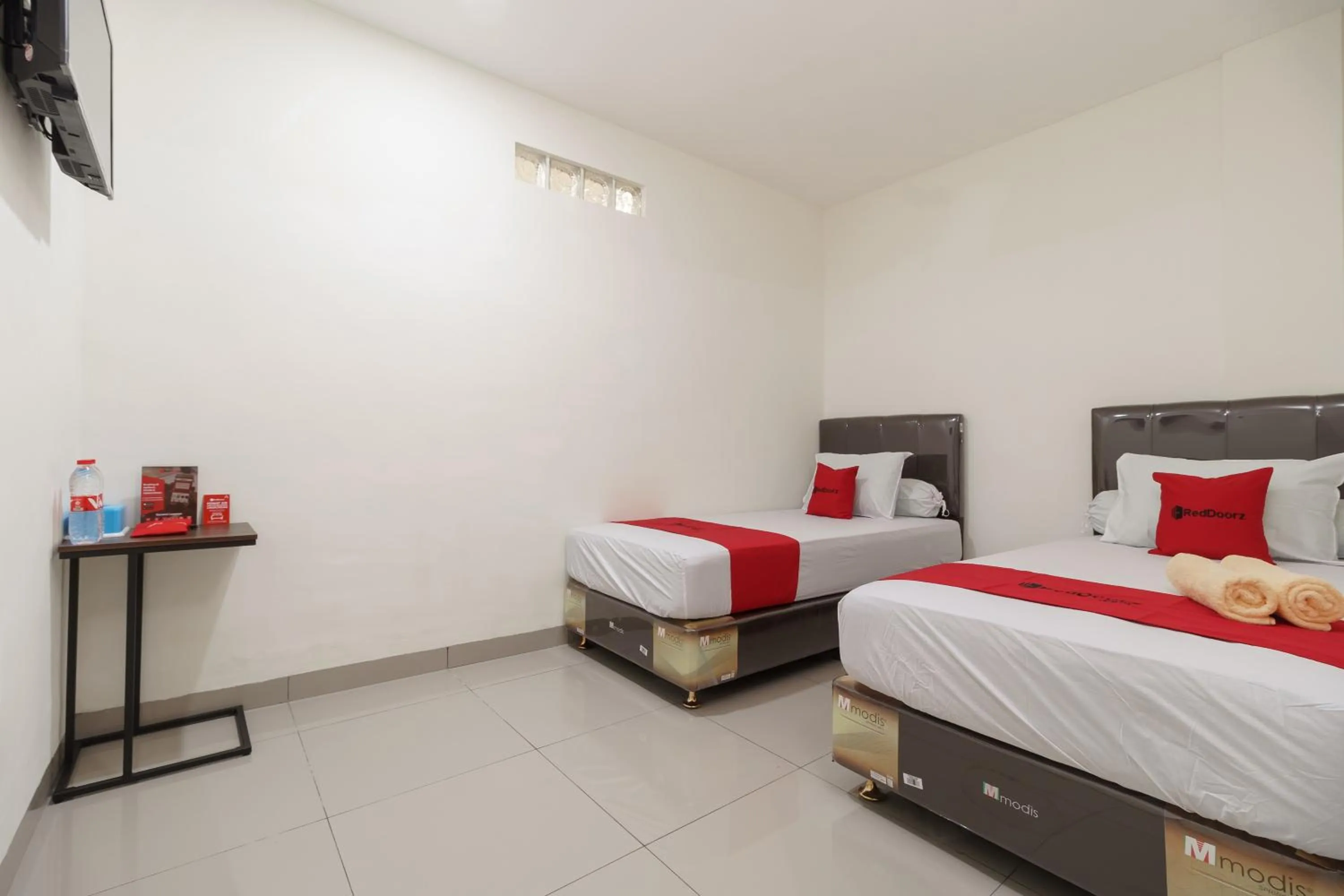 Bedroom in RedDoorz Syariah near Universitas Serambi Mekkah