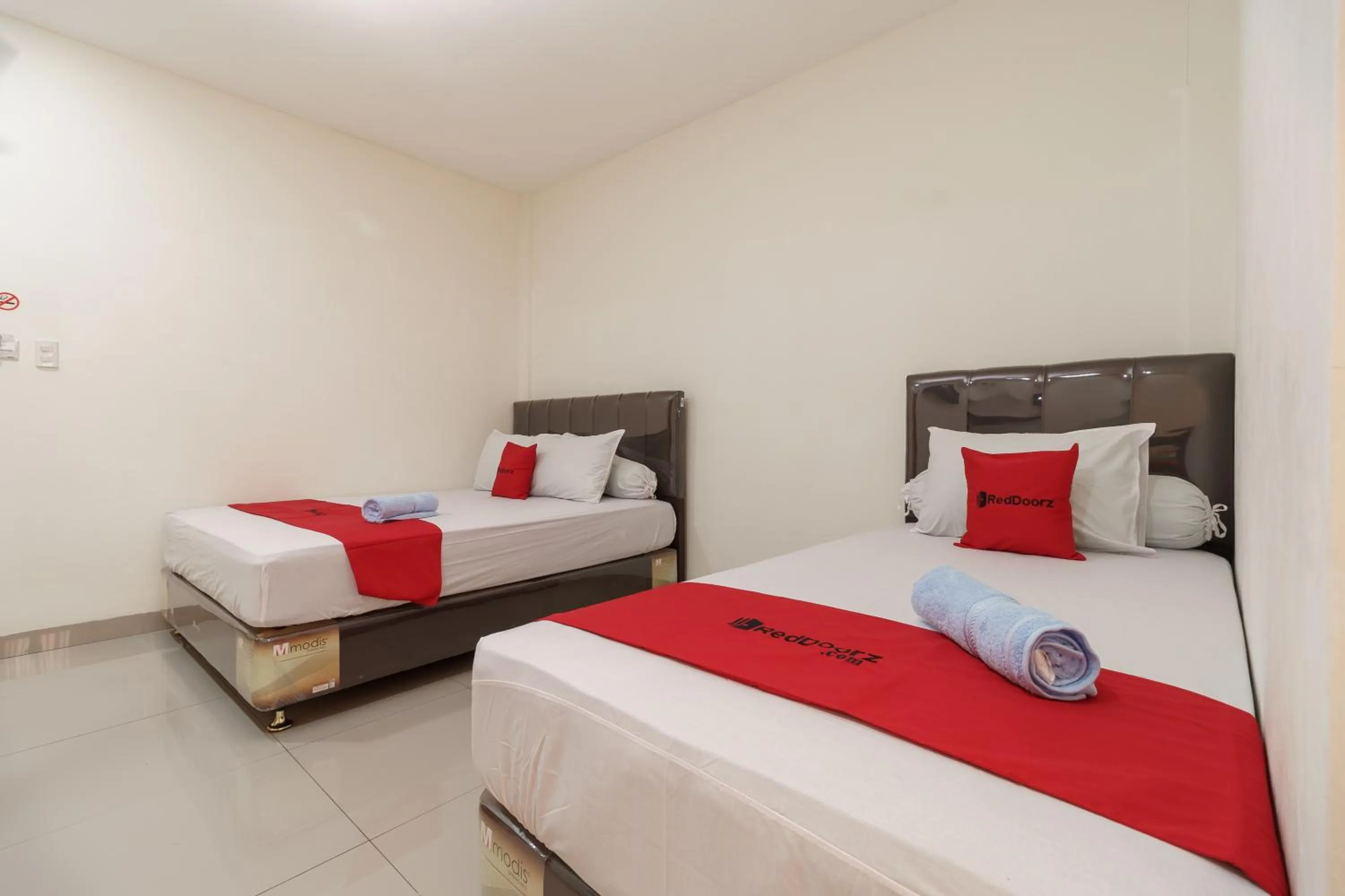 Bedroom in RedDoorz Syariah near Universitas Serambi Mekkah