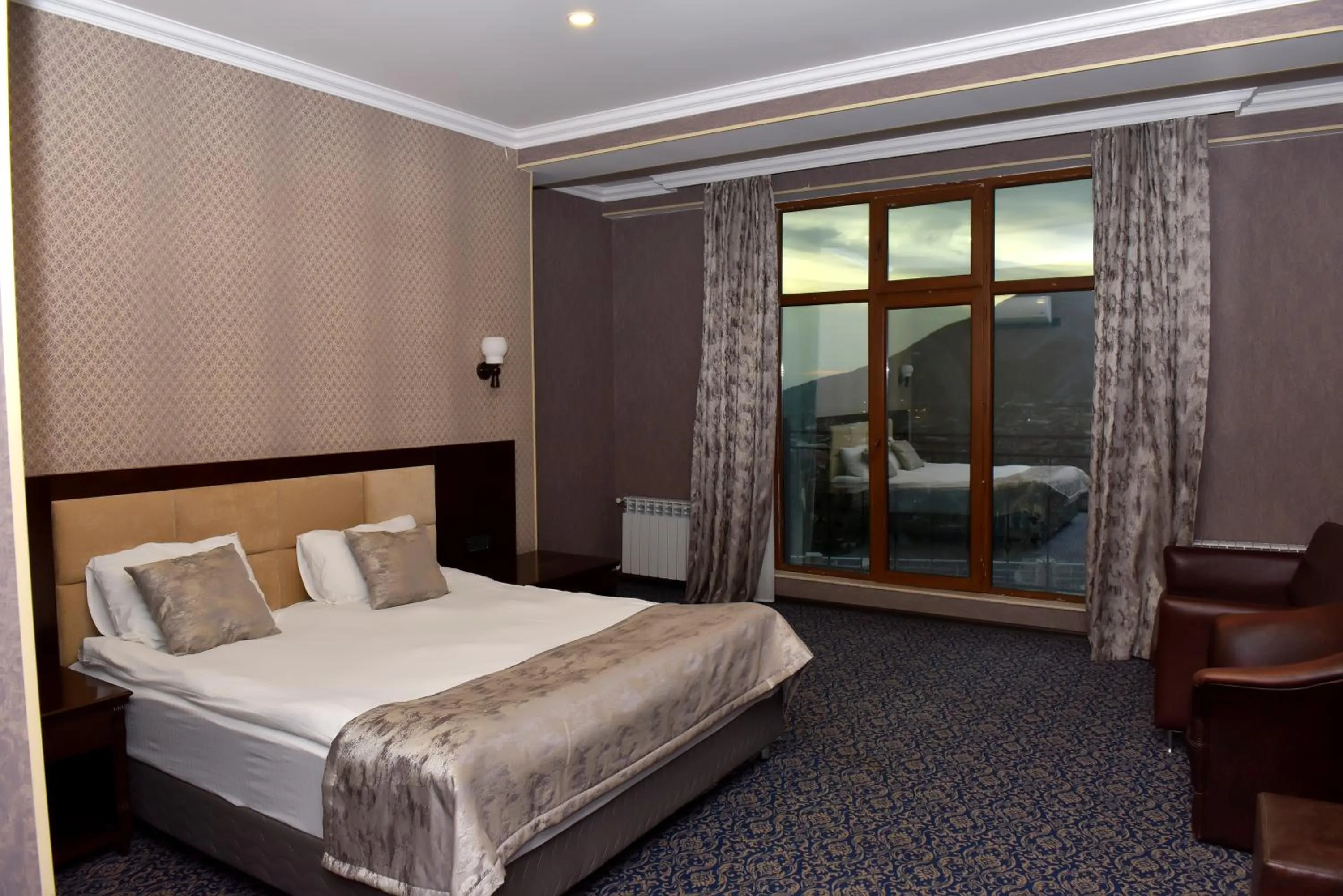 Bed in Ruma Qala Hotel